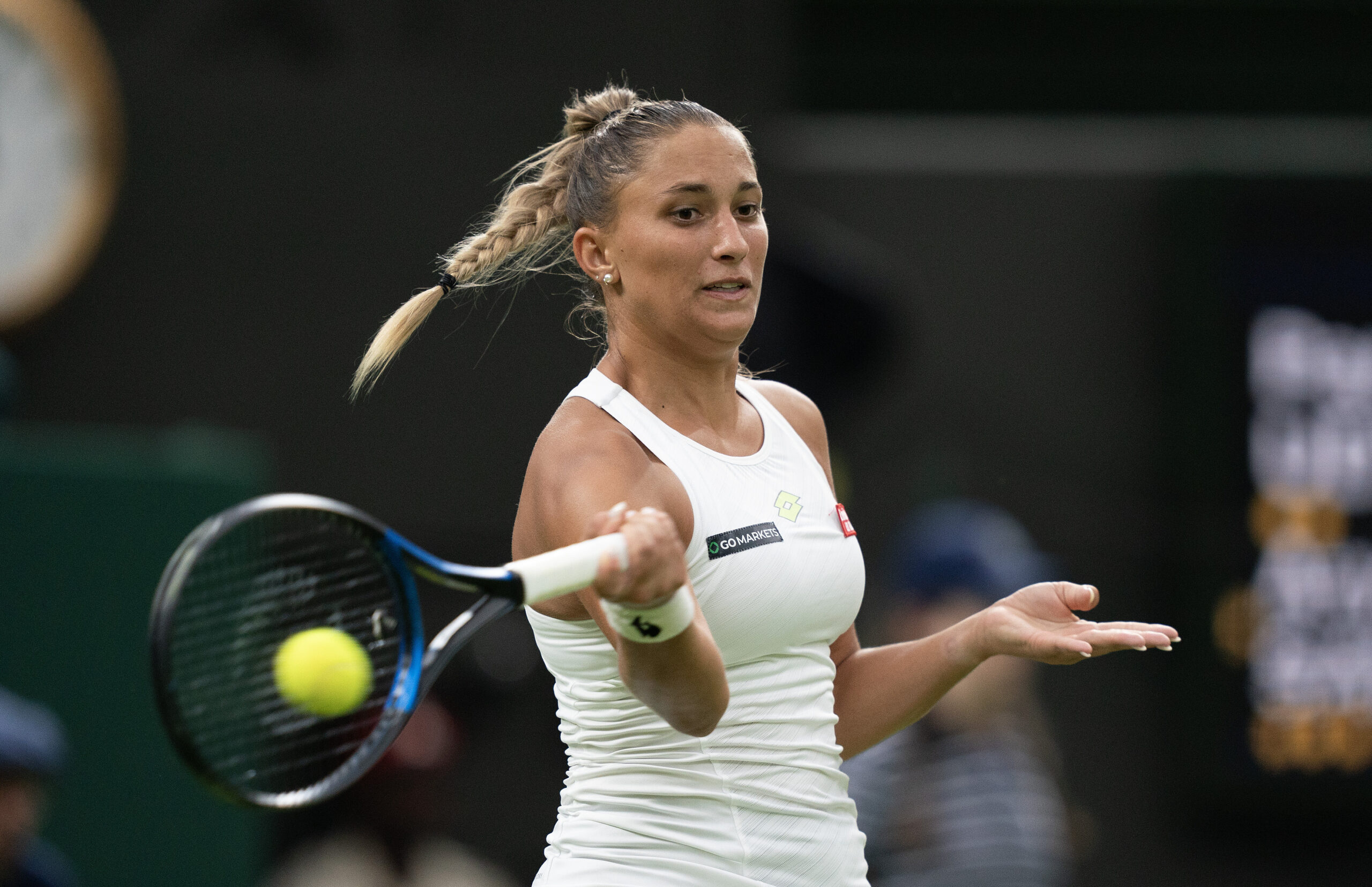 Jul 4, 2023; London, United Kingdom; Panna Udvardy (HUN) returns a shot during her match against Aryna Sabalenka on day two at the All England Lawn Tennis and Croquet Club.  Mandatory Credit: Susan Mullane-Imagn Images