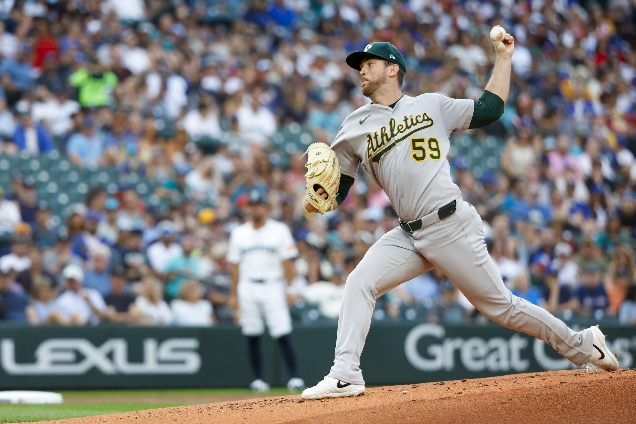 Aug 23, 2025; Seattle, Washington, USA; Athletics starting pitcher Jeffrey Springs (59) throws against the Seattle Mariners during the first inning at T-Mobile Park. Mandatory Credit: Joe Nicholson-Imagn Images