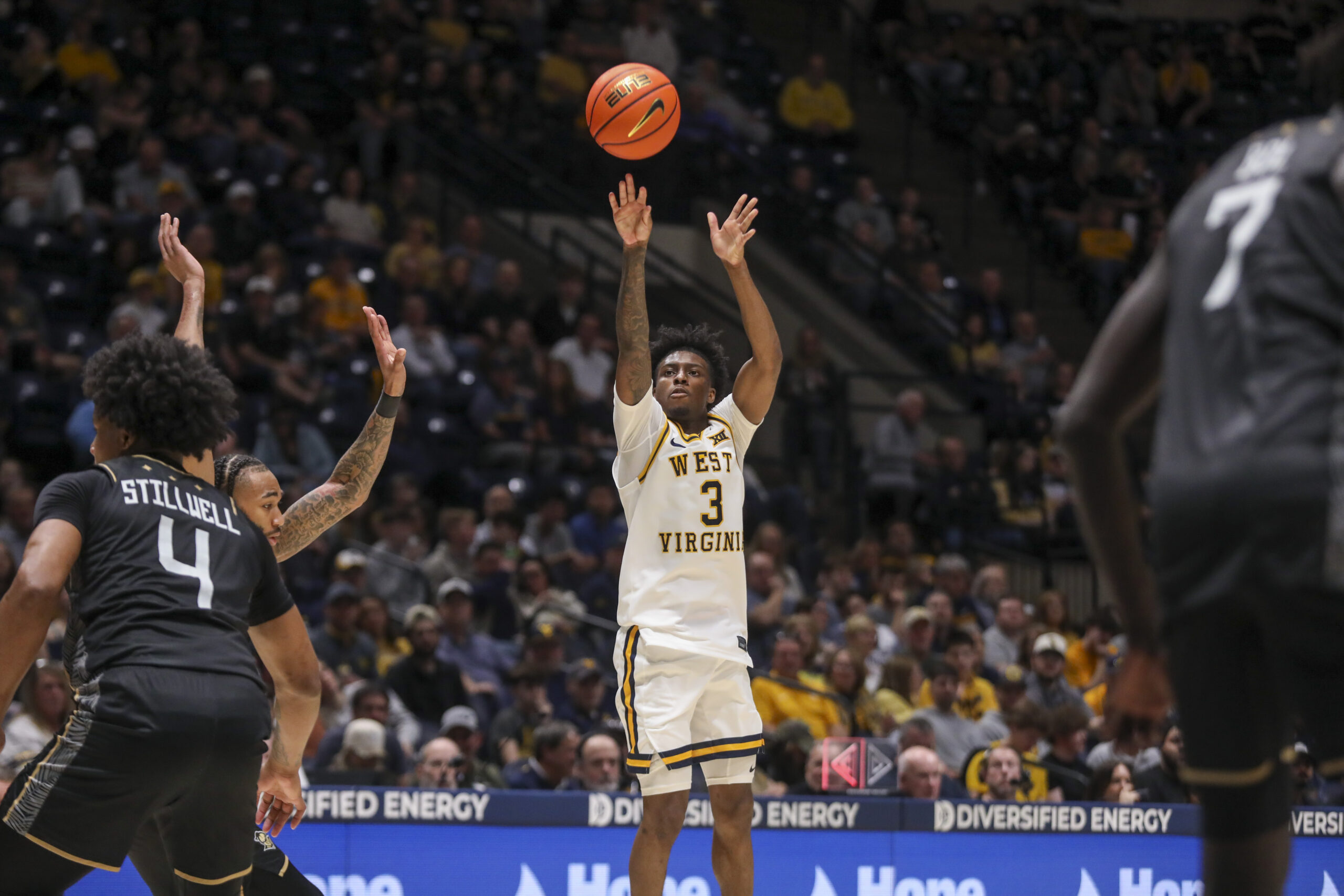 Mar 6, 2026; Morgantown, West Virginia, USA; West Virginia Mountaineers guard Honor Huff (3) shoots a three-point shot during the second half against the UCF Knights at Hope Coliseum. Mandatory Credit: Ben Queen-Imagn Images