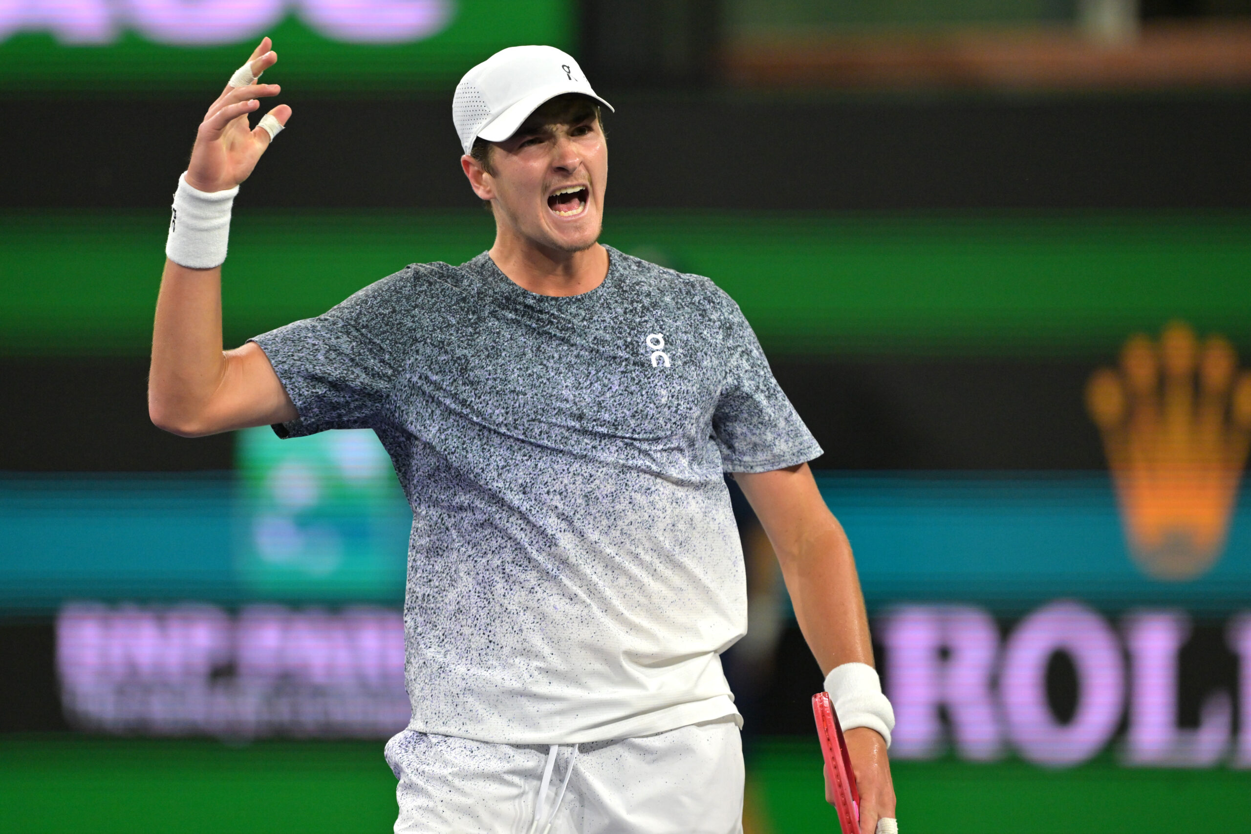 Mar 10, 2026; Indian Wells, CA, USA; Joao Fonseca (BRA) reacts after a point during his the fourth round against Jannik Sinner (ITA) in the BNP Paribas Open at the Indian Wells Tennis Garden. Mandatory Credit: Jayne Kamin-Oncea-Imagn Images