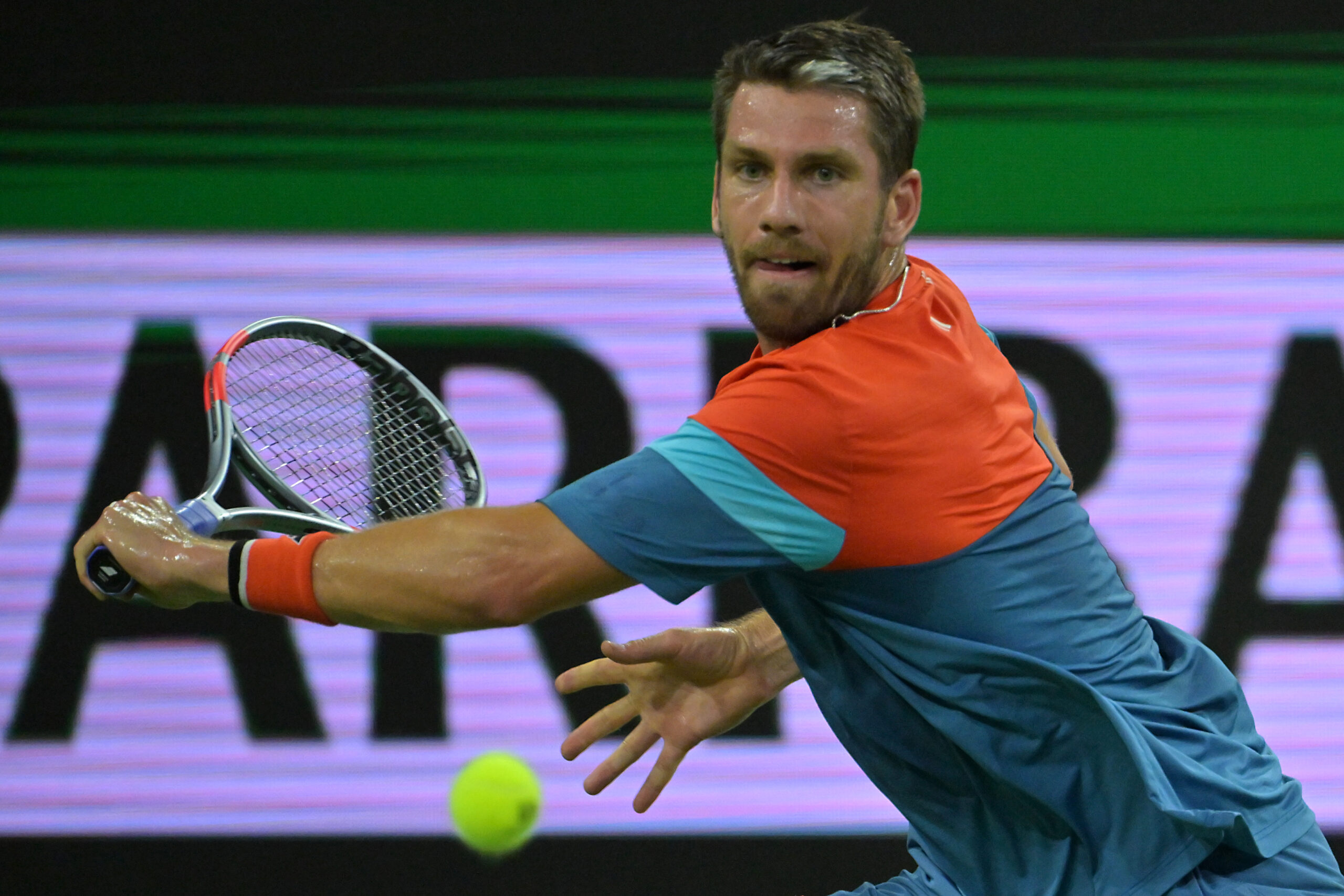 Mar 12, 2026; Indian Wells, CA, USA;  Cameron Norrie (GBR) hits a shot during his quarterfinal match Carlos Alcaraz (ESP) in the BNP Paribas Open at the Indian Wells Tennis Garden. Mandatory Credit: Jayne Kamin-Oncea-Imagn Images