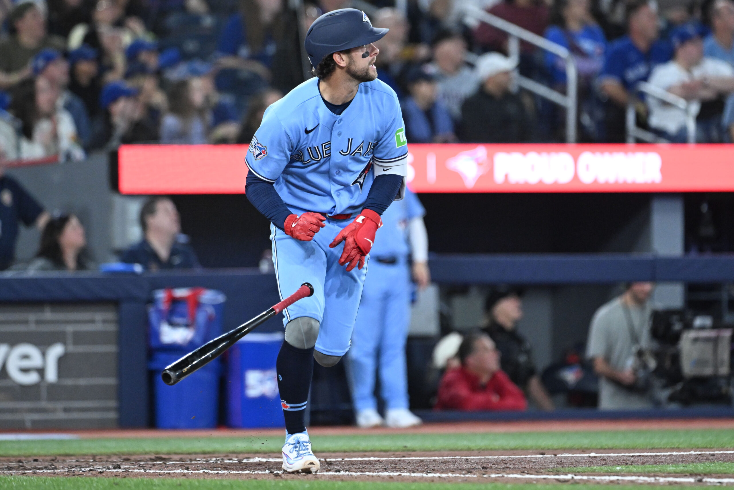 Mar 31, 2026; Toronto, Ontario, CAN;  Toronto Blue Jays second baseman Ernie Clement (22) hits an RBI double against the Colorado Rockies in the seventh inning at Rogers Centre. Mandatory Credit: Dan Hamilton-Imagn Images