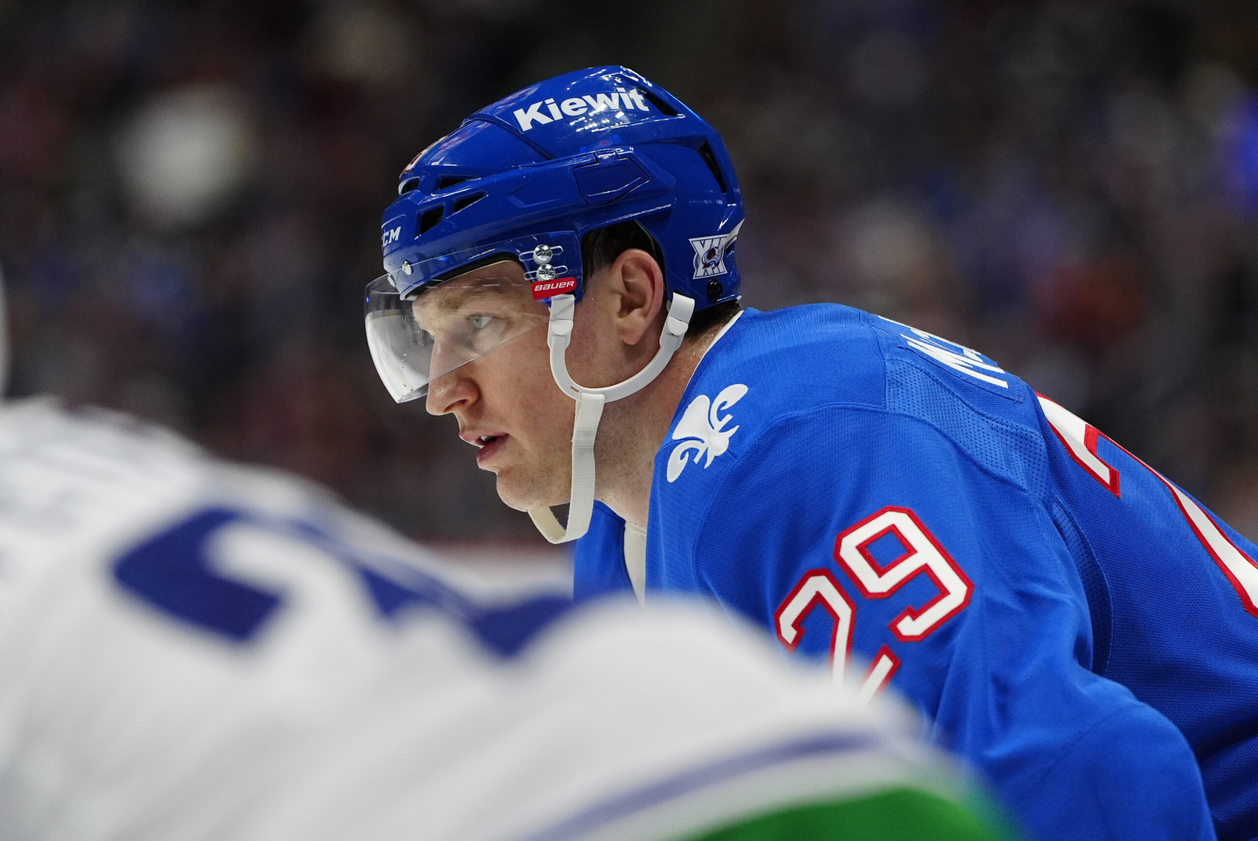 Apr 1, 2026; Denver, Colorado, USA; Colorado Avalanche center Nathan MacKinnon (29) during the second period against the Vancouver Canucks at Ball Arena. Mandatory Credit: Ron Chenoy-Imagn Images