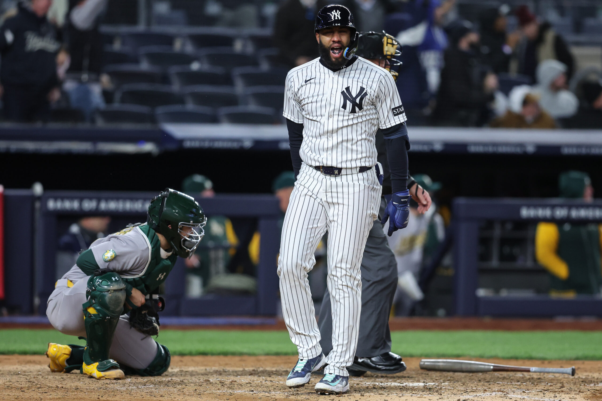 Apr 7, 2026; Bronx, New York, USA;  New York Yankees third baseman Amed Rosario (14) hits a three run home run in the eighth inning against the Athletics at Yankee Stadium. Mandatory Credit: Wendell Cruz-Imagn Images