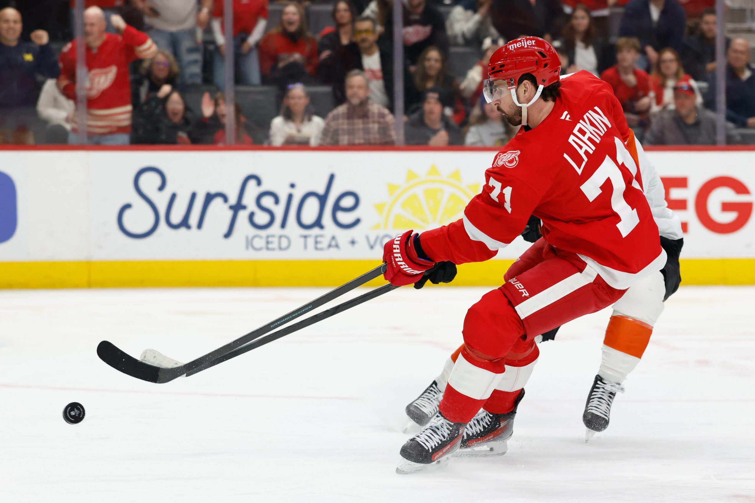 Mar 28, 2026; Detroit, Michigan, USA;  Detroit Red Wings center Dylan Larkin (71) skates with the puck in the second period against the Philadelphia Flyers at Little Caesars Arena. Mandatory Credit: Rick Osentoski-Imagn Images