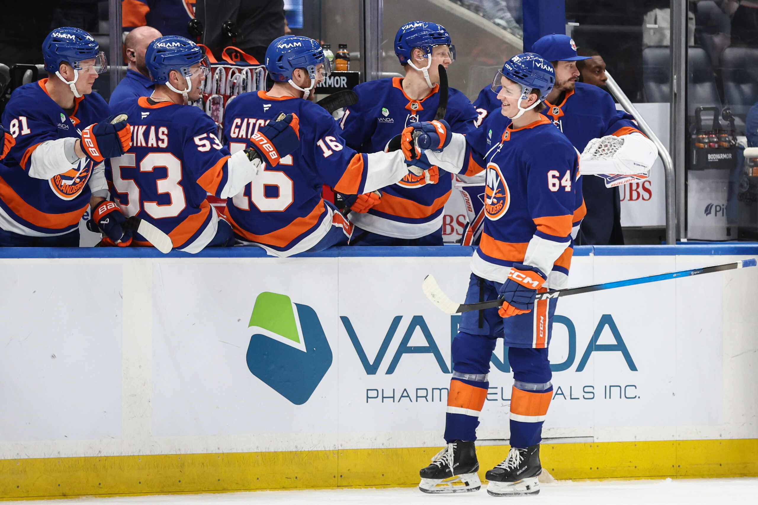 Apr 9, 2026; Elmont, New York, USA;  New York Islanders center Calum Ritchie (64) celebrates with teammates after scoring a goal in the third period against the Toronto Maple Leafs at UBS Arena. Mandatory Credit: Wendell Cruz-Imagn Images