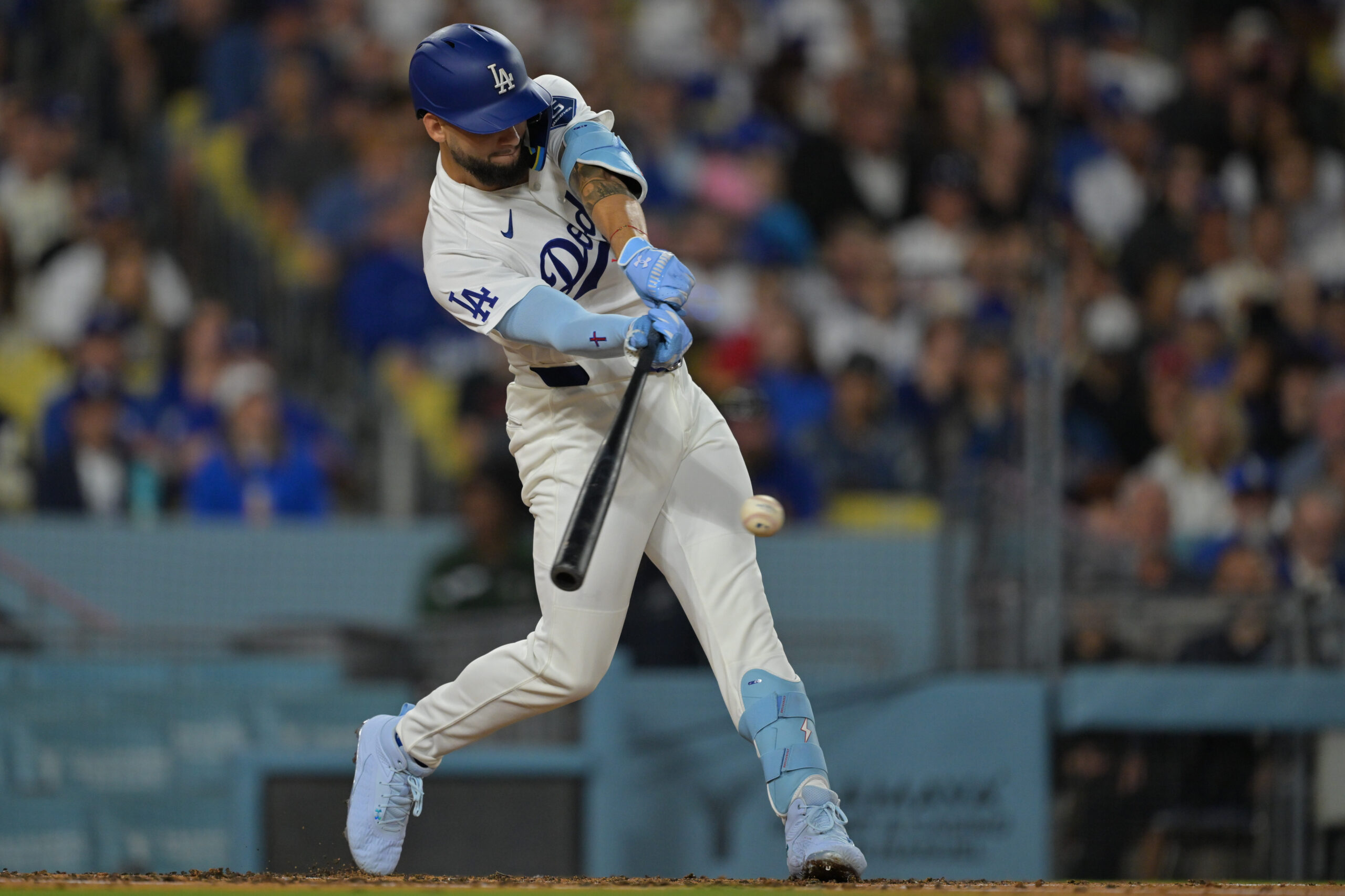 Apr 10, 2026; Los Angeles, California, USA;  Los Angeles Dodgers center fielder Andy Pages (44) hits a single during the second inning against the Texas Rangers at Dodger Stadium. Mandatory Credit: Jayne Kamin-Oncea-Imagn Images