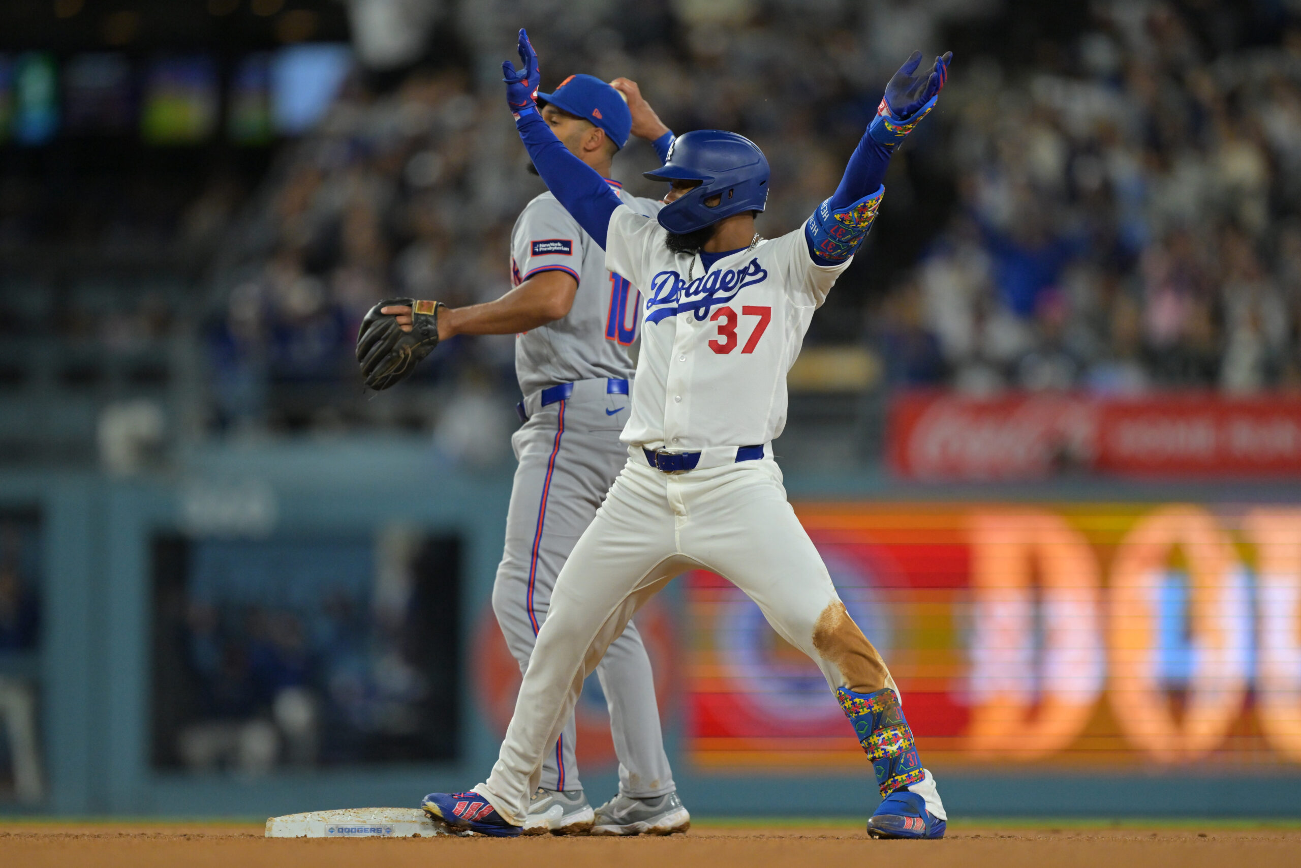 Apr 13, 2026; Los Angeles, California, USA;  Los Angeles Dodgers right fielder Teoscar Hernández (37) on base after a double in the fifth inning against the New York Mets at Dodger Stadium. Mandatory Credit: Jayne Kamin-Oncea-Imagn Images