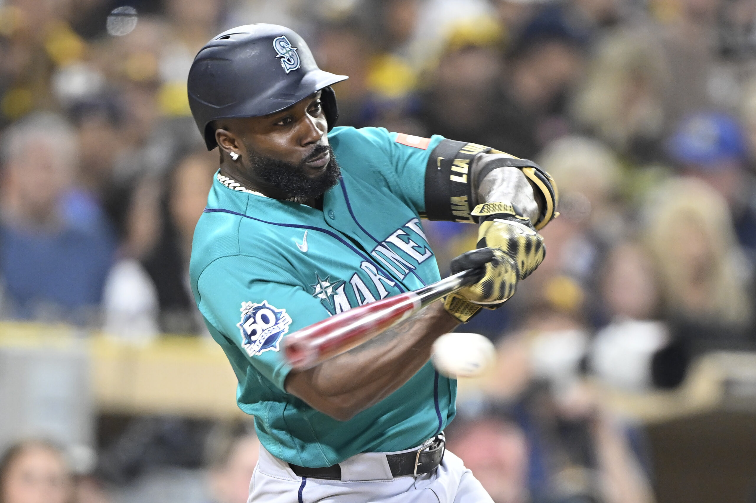 Apr 15, 2026; San Diego, California, USA; Seattle Mariners left fielder Randy Arozarena hits a single during the fifth inning against the San Diego Padres at Petco Park. All MLB players are wearing number 42 today to honor Jackie Robinson. Mandatory Credit: Denis Poroy-Imagn Images
