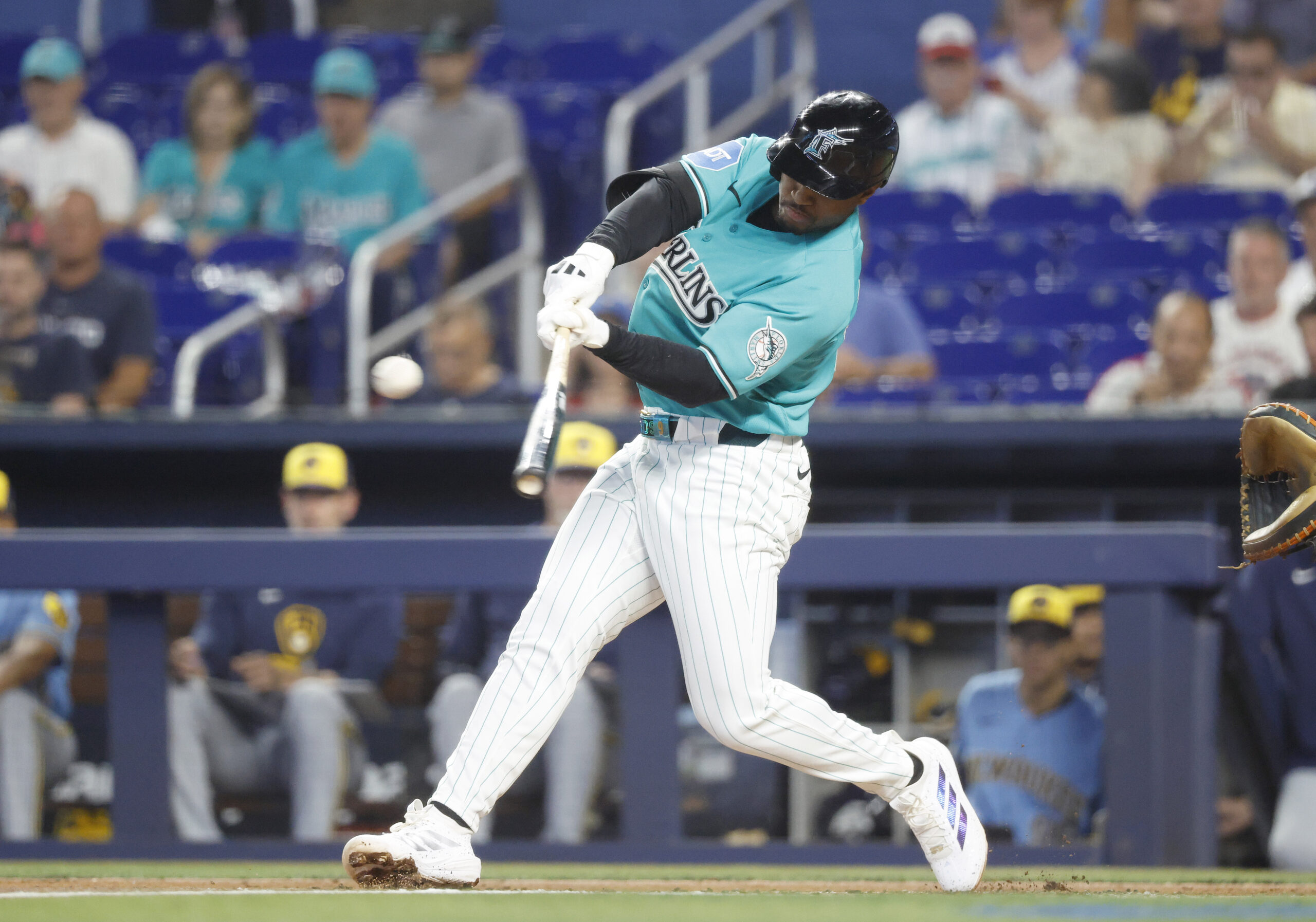 Apr 19, 2026; Miami, Florida, USA;  Miami Marlins shortstop Xavier Edwards (9) at bat against the Milwaukee Brewers during the first inning at loanDepot Park. Mandatory Credit: Rhona Wise-Imagn Images