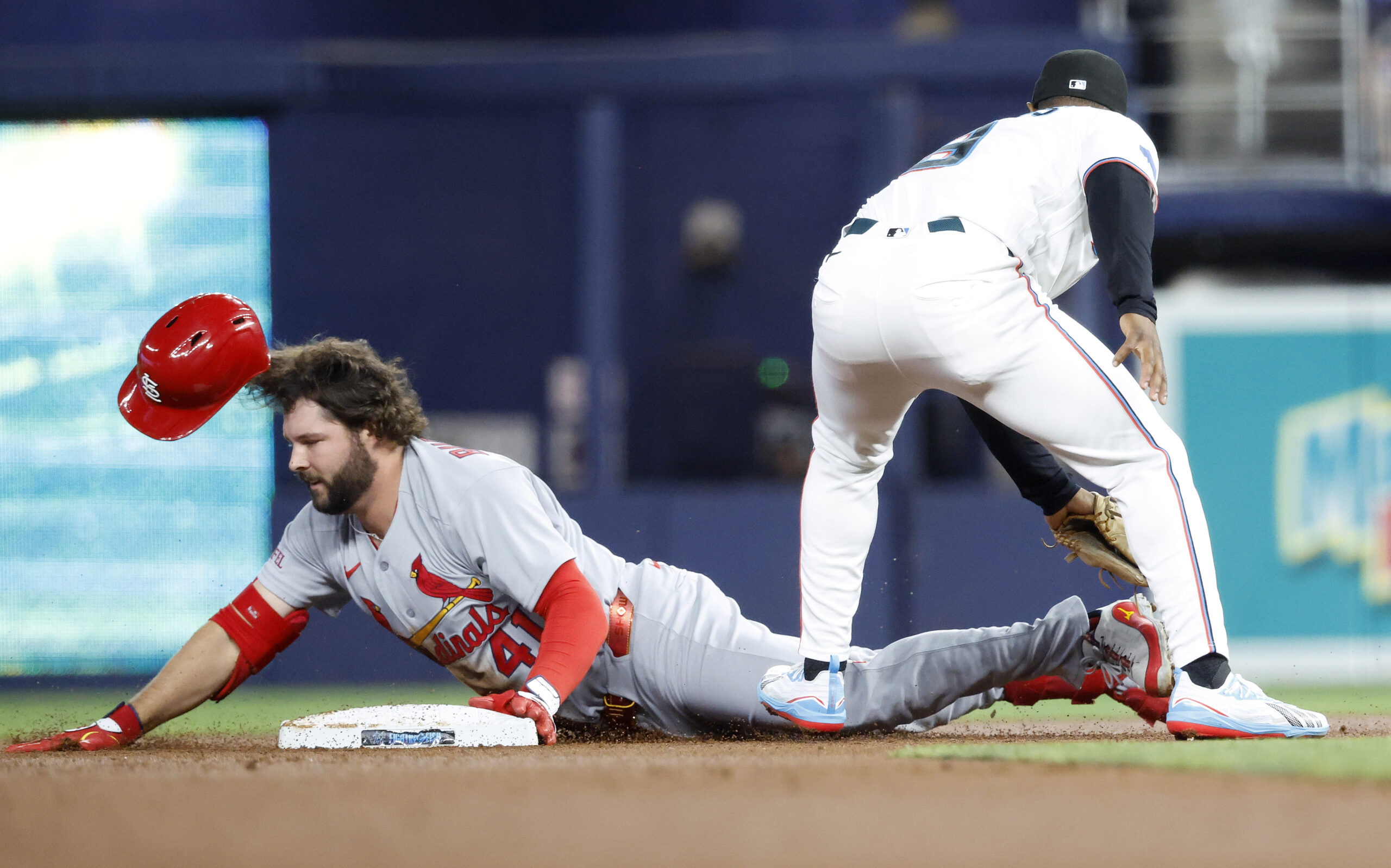 Apr 21, 2026; Miami, Florida, USA;  St. Louis Cardinals first baseman Alec Burleson (41) slides into second base against the Miami Marlins during the first inning at loanDepot Park. Mandatory Credit: Rhona Wise-Imagn Images