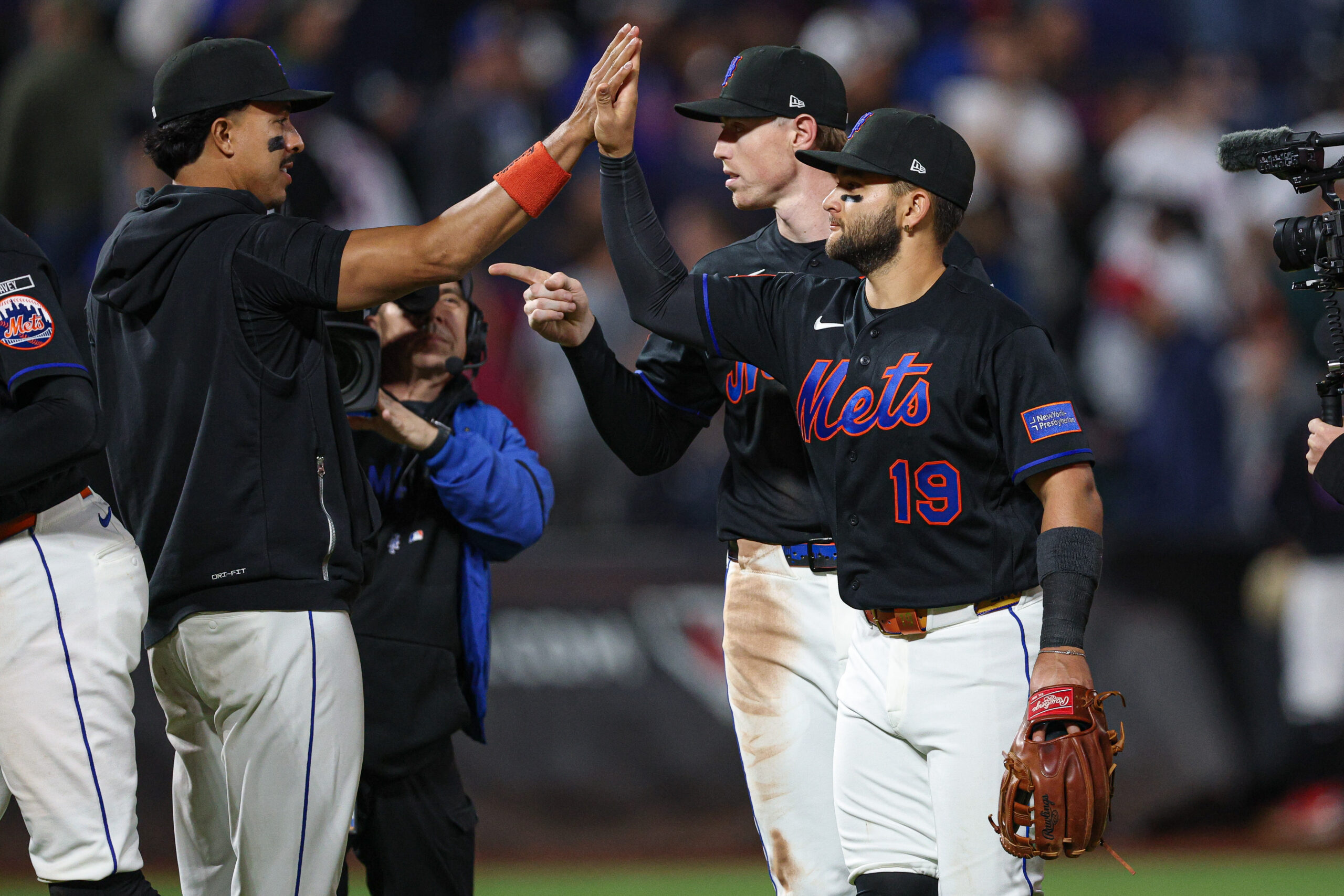 Apr 23, 2026; New York City, New York, USA;  New York Mets shortstop Bo Bichette (19) celebrates with teammates after defeating the Minnesota Twins at Citi Field. Mandatory Credit: Vincent Carchietta-Imagn Images