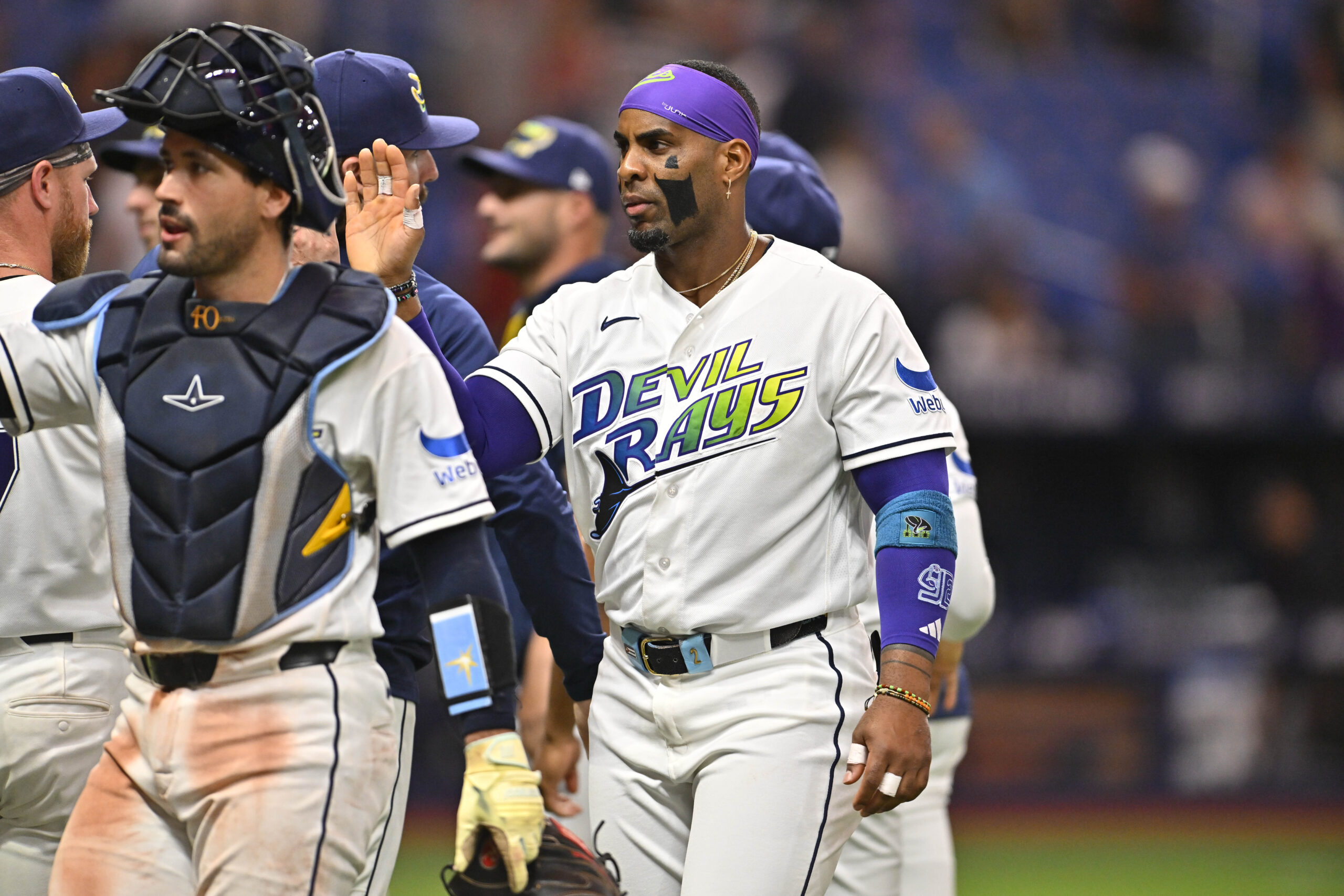 Apr 24, 2026; St. Petersburg, Florida, USA; Tampa Bay Rays infielder Yandy Diaz (2) celebrates with teammates during the ninth inning against the Minnesota Twins at Tropicana Field. Mandatory Credit: Pablo Robles-Imagn Images