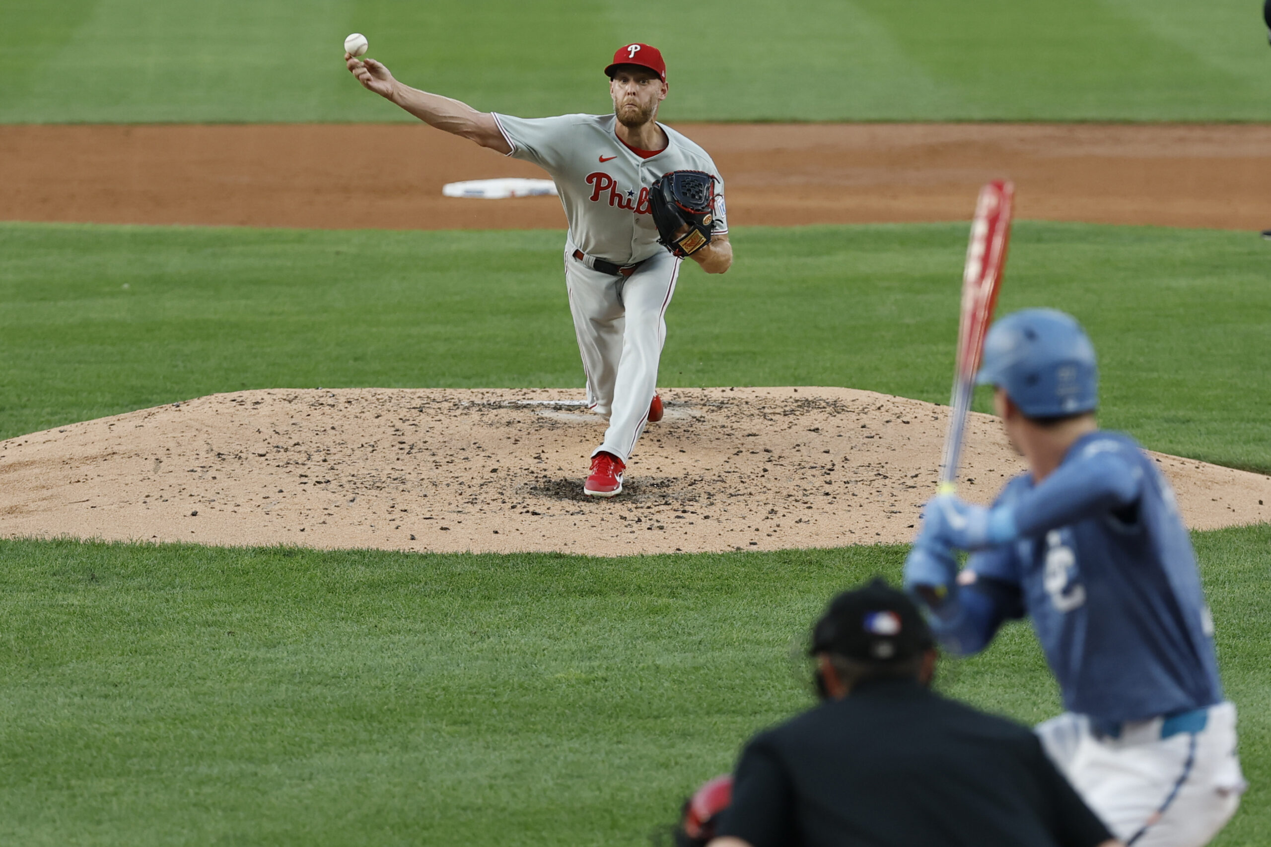 Aug 15, 2025; Washington, District of Columbia, USA; Philadelphia Phillies starting pitcher Zack Wheeler (45) pitches against Washington Nationals outfielder Robert Hassell III (57) during the second inning at Nationals Park. Mandatory Credit: Geoff Burke-Imagn Images