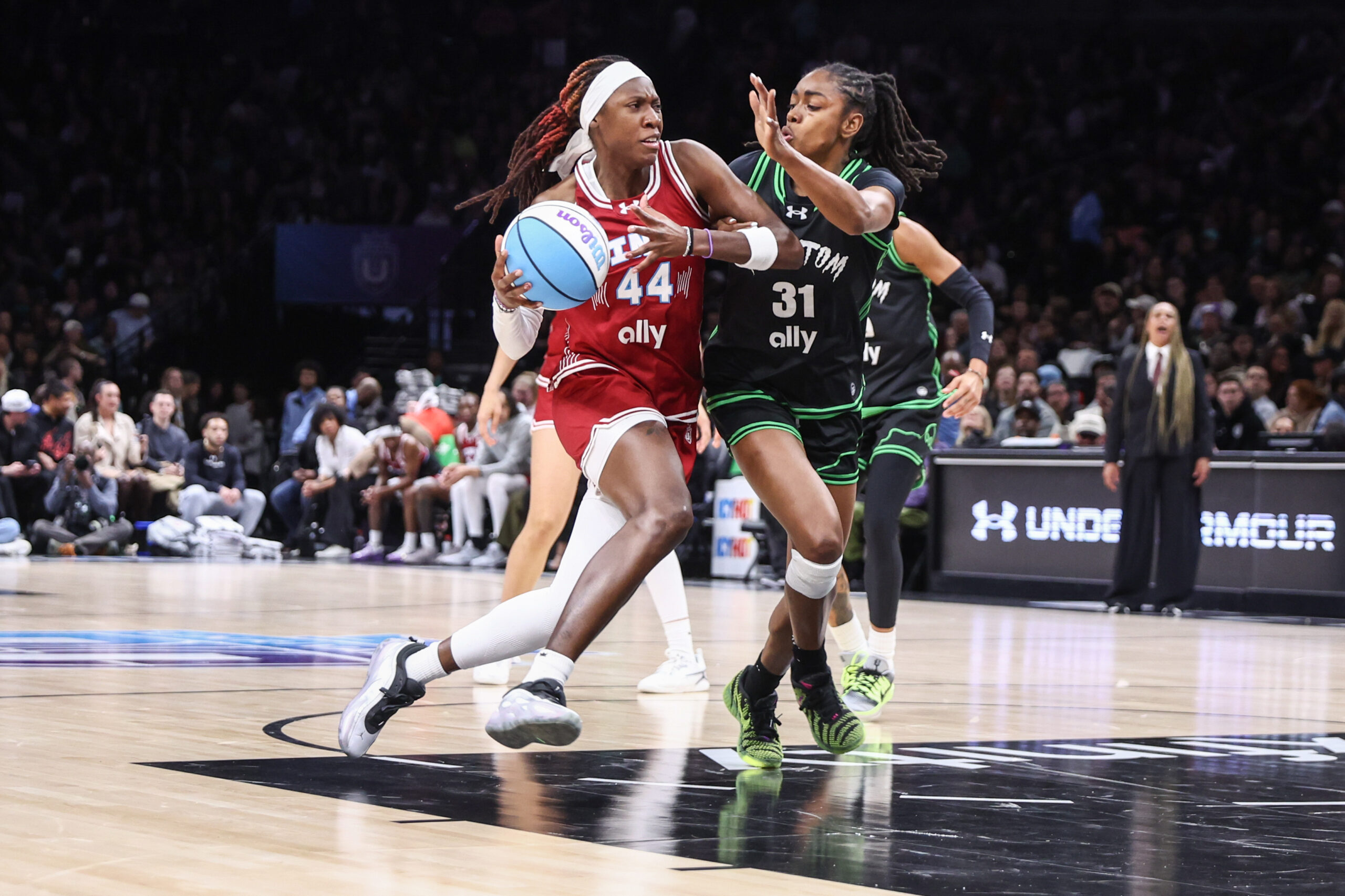 Mar 2, 2026; Brooklyn, NY, USA;  Vinyl BC wing Rhyne Howard (44) looks to drive past Phantom BC guard Tiffany Hayes (31) in the fourth quarter at Barclay's Center. Mandatory Credit: Wendell Cruz-Imagn Images