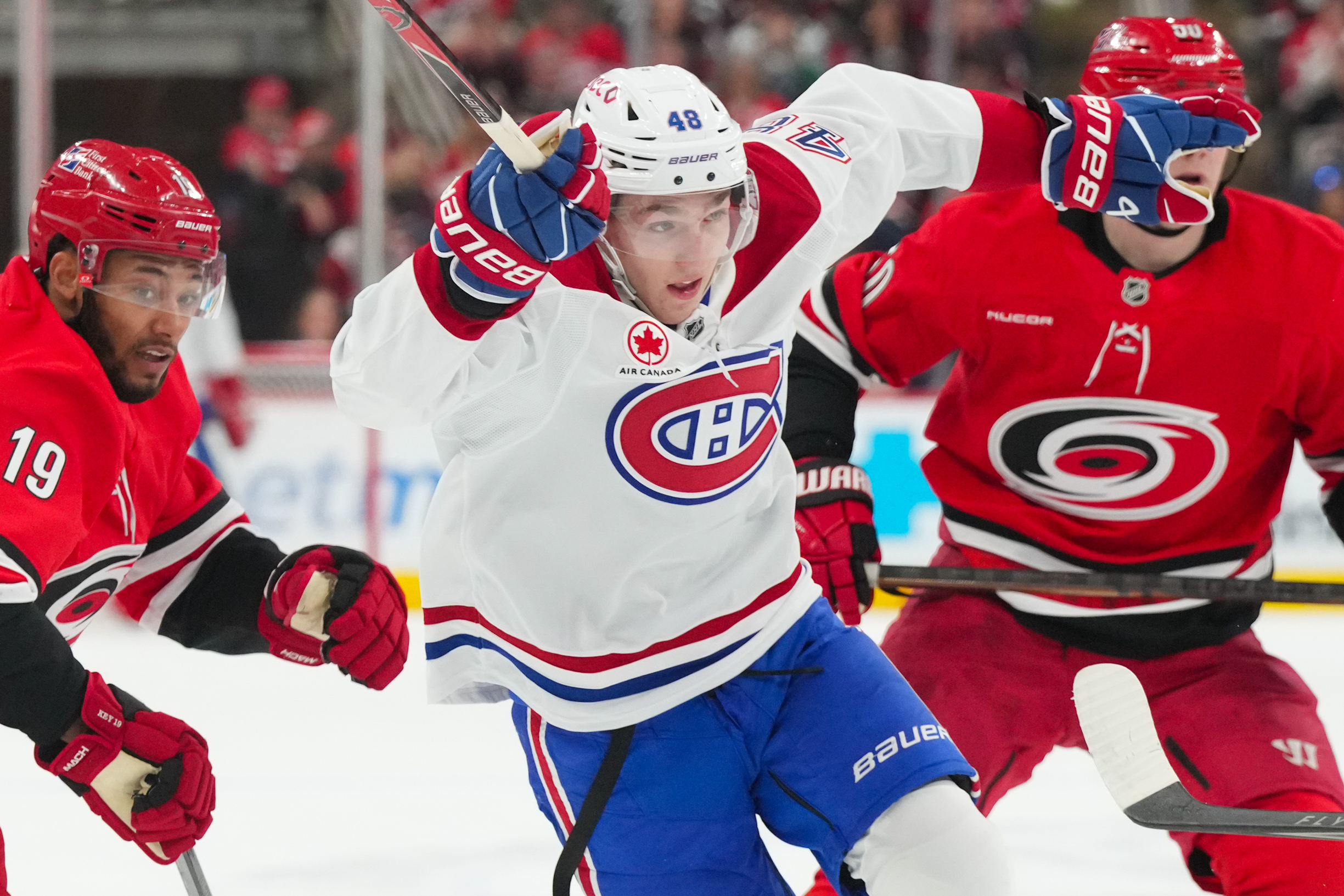 Mar 29, 2026; Raleigh, North Carolina, USA; Montreal Canadiens defenseman Lane Hutson (48) skates against the Carolina Hurricanes during the second period at Lenovo Center. Mandatory Credit: James Guillory-Imagn Images