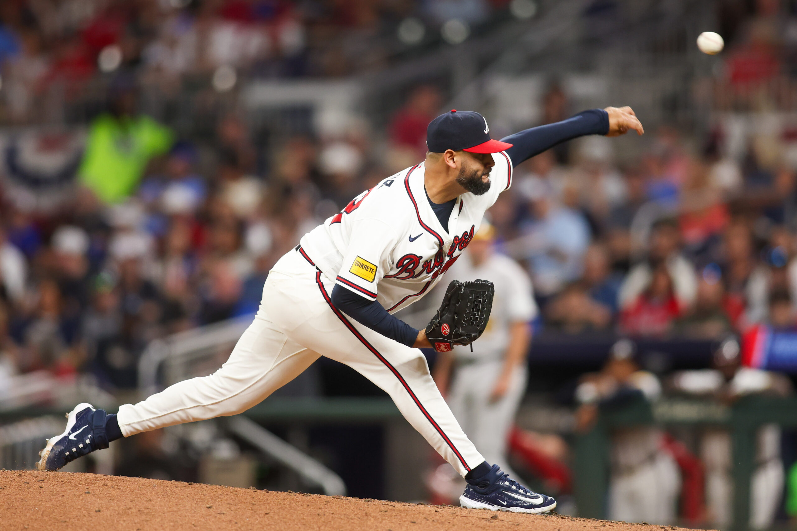 Mar 31, 2026; Atlanta, Georgia, USA; Atlanta Braves relief pitcher Martin Perez (33) throws against the Athletics in the sixth inning at Truist Park. Mandatory Credit: Brett Davis-Imagn Images