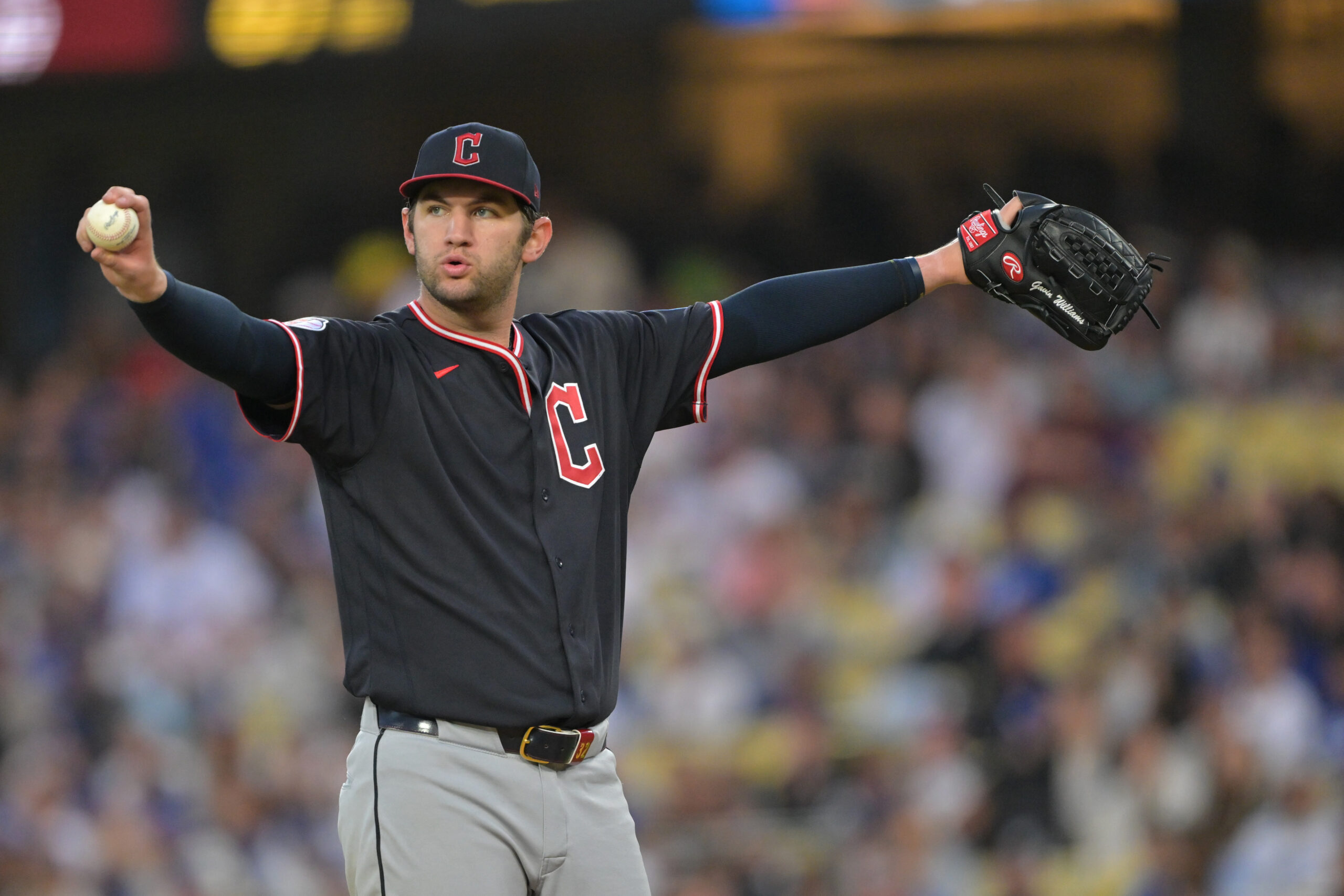 Apr 1, 2026; Los Angeles, California, USA;  Cleveland Guardians pitcher Gavin Williams (32) gets set on the mound in the seventh inning against the Los Angeles Dodgers at Dodger Stadium. Mandatory Credit: Jayne Kamin-Oncea-Imagn Images