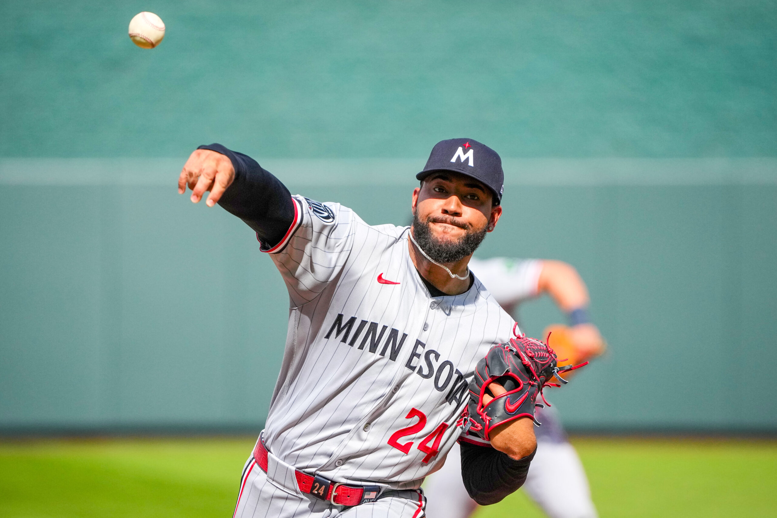 Mar 30, 2026; Kansas City, Missouri, USA; Minnesota Twins starting pitcher Simeon Woods Richardson (24) delivers a warm up pitch against the Kansas City Royals during the game at Kauffman Stadium. Mandatory Credit: Denny Medley-Imagn Images
