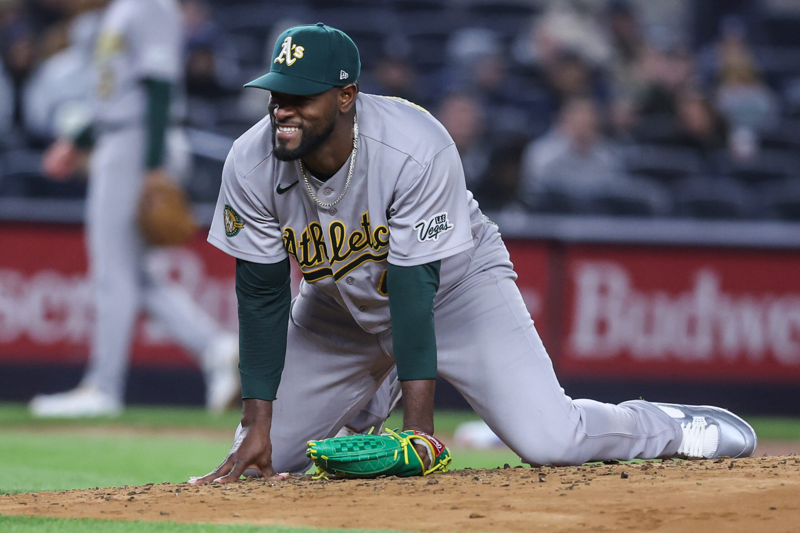 Apr 8, 2026; Bronx, New York, USA; Athletics starting pitcher Luis Severino (40) reacts after almost getting hit by the ball in the third inning against the New York Yankees at Yankee Stadium. Mandatory Credit: Wendell Cruz-Imagn Images