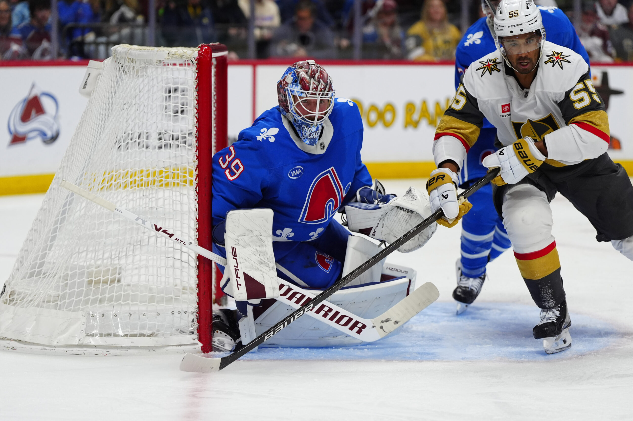 Apr 11, 2026; Denver, Colorado, USA; Vegas Golden Knights right wing Keegan Kolesar (55) and Colorado Avalanche goaltender MacKenzie Blackwood (39) during the third period at Ball Arena. Mandatory Credit: Ron Chenoy-Imagn Images