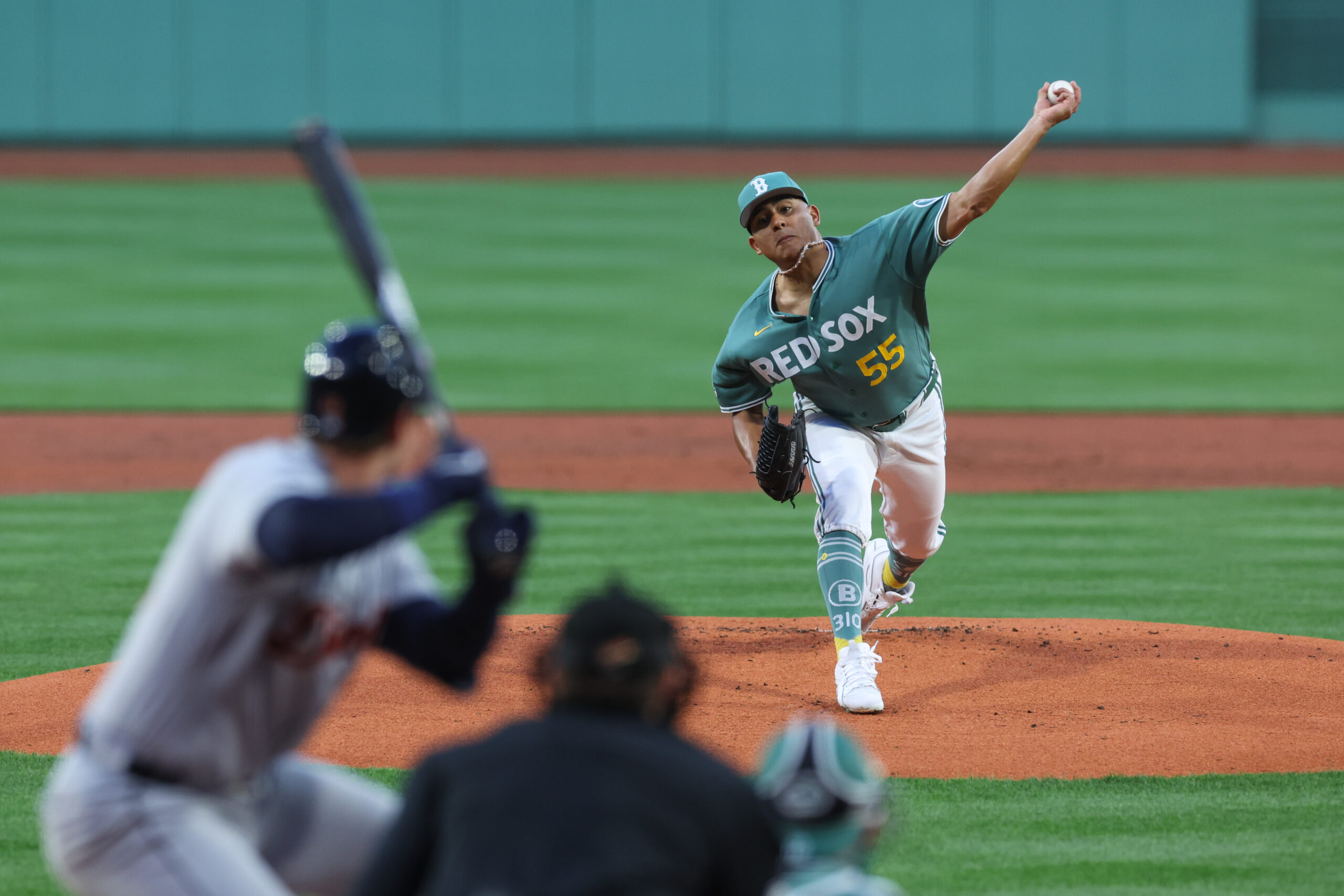 Apr 17, 2026; Boston, Massachusetts, USA; Boston Red Sox starting pitcher Ranger Suarez (55) delivers a pitch during the first inning against the Detroit Tigers at Fenway Park. Mandatory Credit: Paul Rutherford-Imagn Images