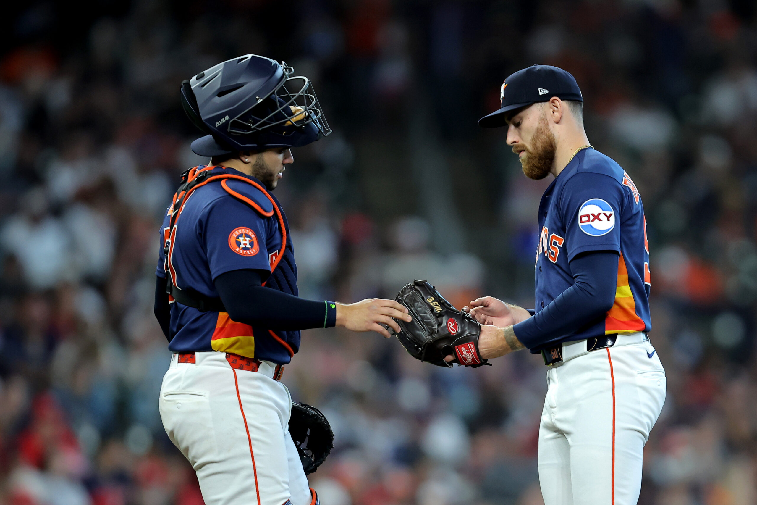 Apr 19, 2026; Houston, Texas, USA; Houston Astros catcher Yainer Diaz (21) visits pitcher Mike Burrows (50) on the mound against the St. Louis Cardinals during the fifth inning at Daikin Park. Mandatory Credit: Erik Williams-Imagn Images