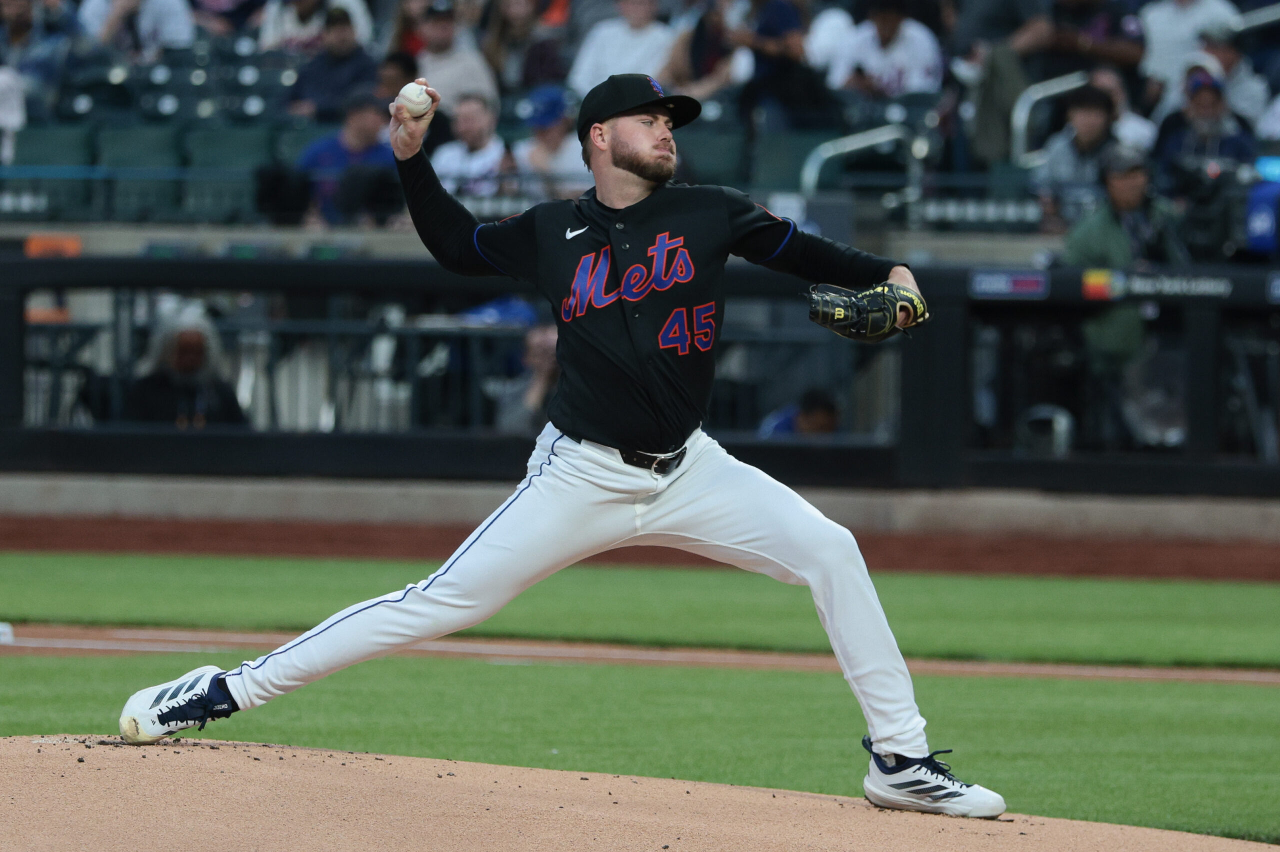 Apr 23, 2026; New York City, New York, USA;  New York Mets pitcher Christian Scott (45) delivers a pitch during the first inning against the Minnesota Twins at Citi Field. Mandatory Credit: Vincent Carchietta-Imagn Images