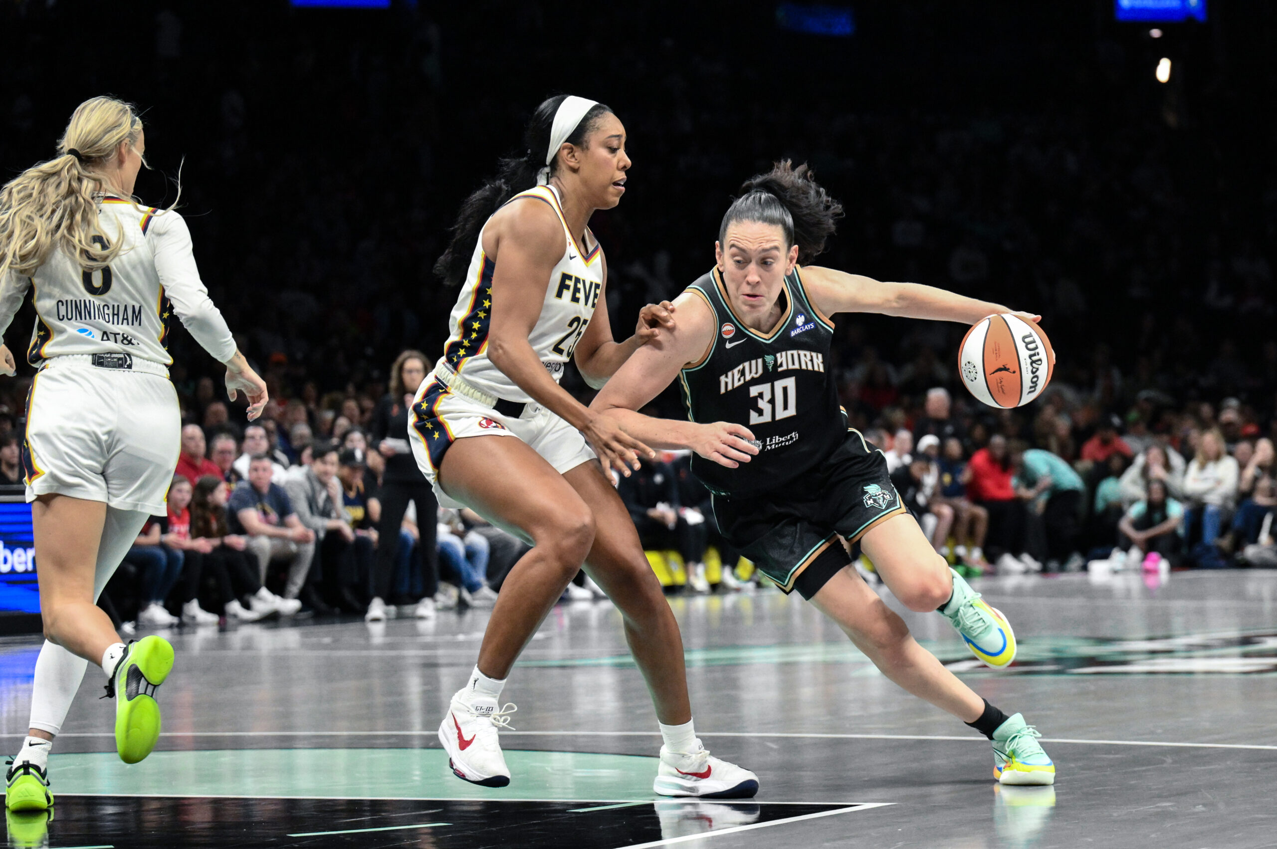 Apr 25, 2026; Brooklyn, NY, USA; New York Liberty forward Breanna Stewart (30) drives to the basket while defended by Indiana Fever forward Monique Billings (25) during the first half at Barclays Center. Mandatory Credit: John Jones-Imagn Images