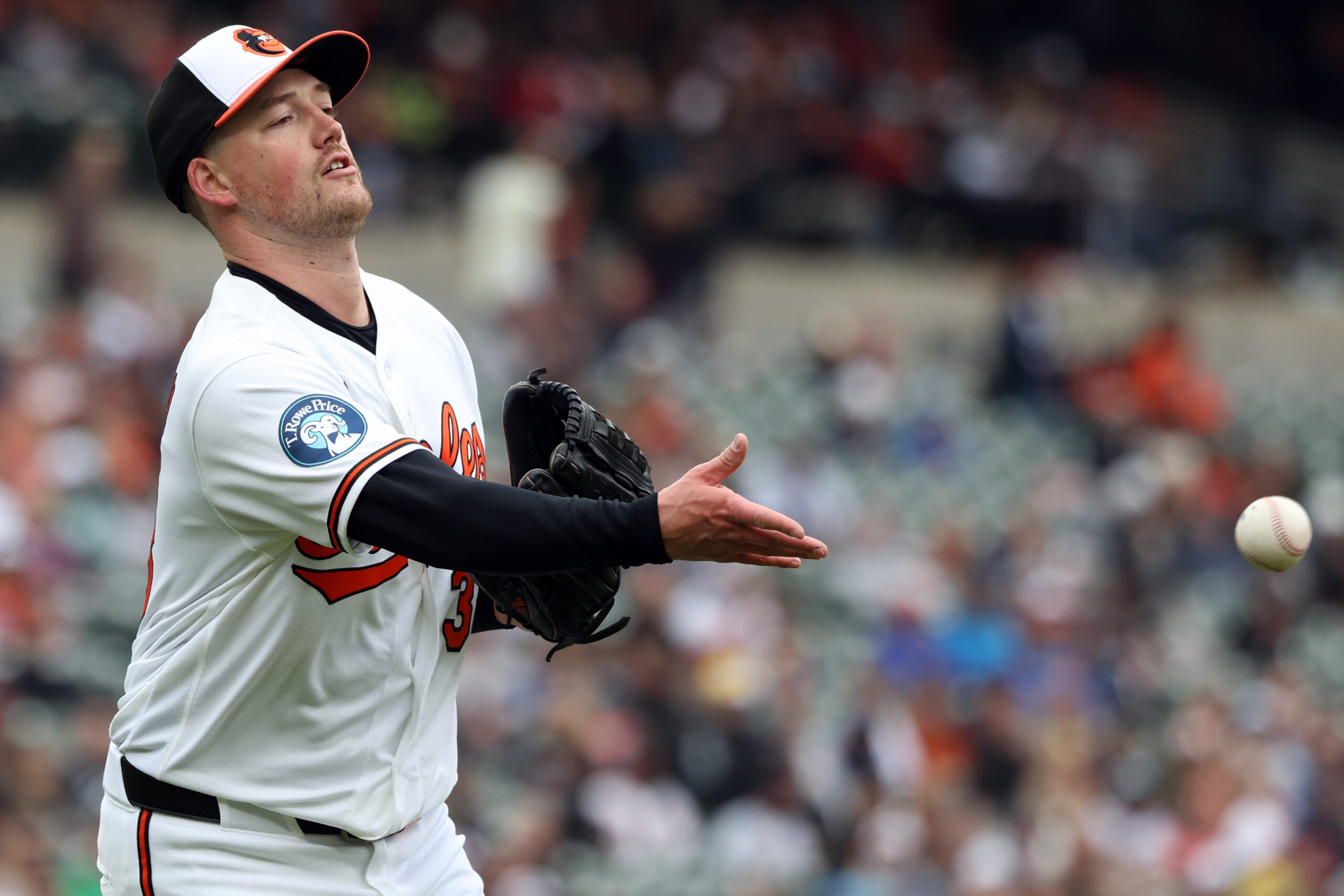 Apr 26, 2026; Baltimore, Maryland, USA; Baltimore Orioles pitcher Kyle Bradish (38) throws to first for an out during the second inning against the Boston Red Sox at Oriole Park at Camden Yards. Mandatory Credit: Daniel Kucin Jr.-Imagn Images