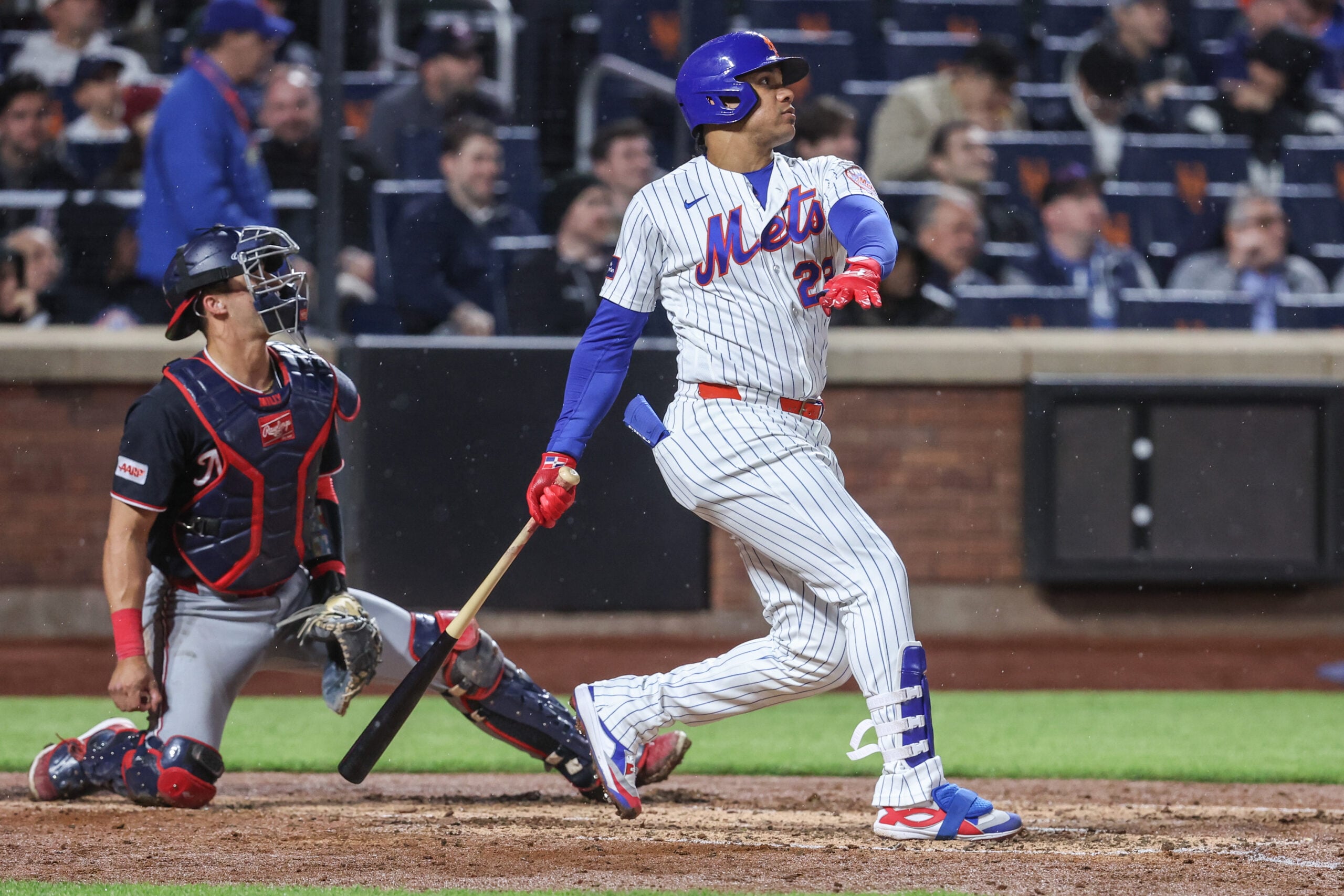 Apr 28, 2026; New York City, New York, USA; New York Mets designated hitter Juan Soto (22) hits a two run home run in the fourth inning against the Washington Nationals at Citi Field. Mandatory Credit: Wendell Cruz-Imagn Images