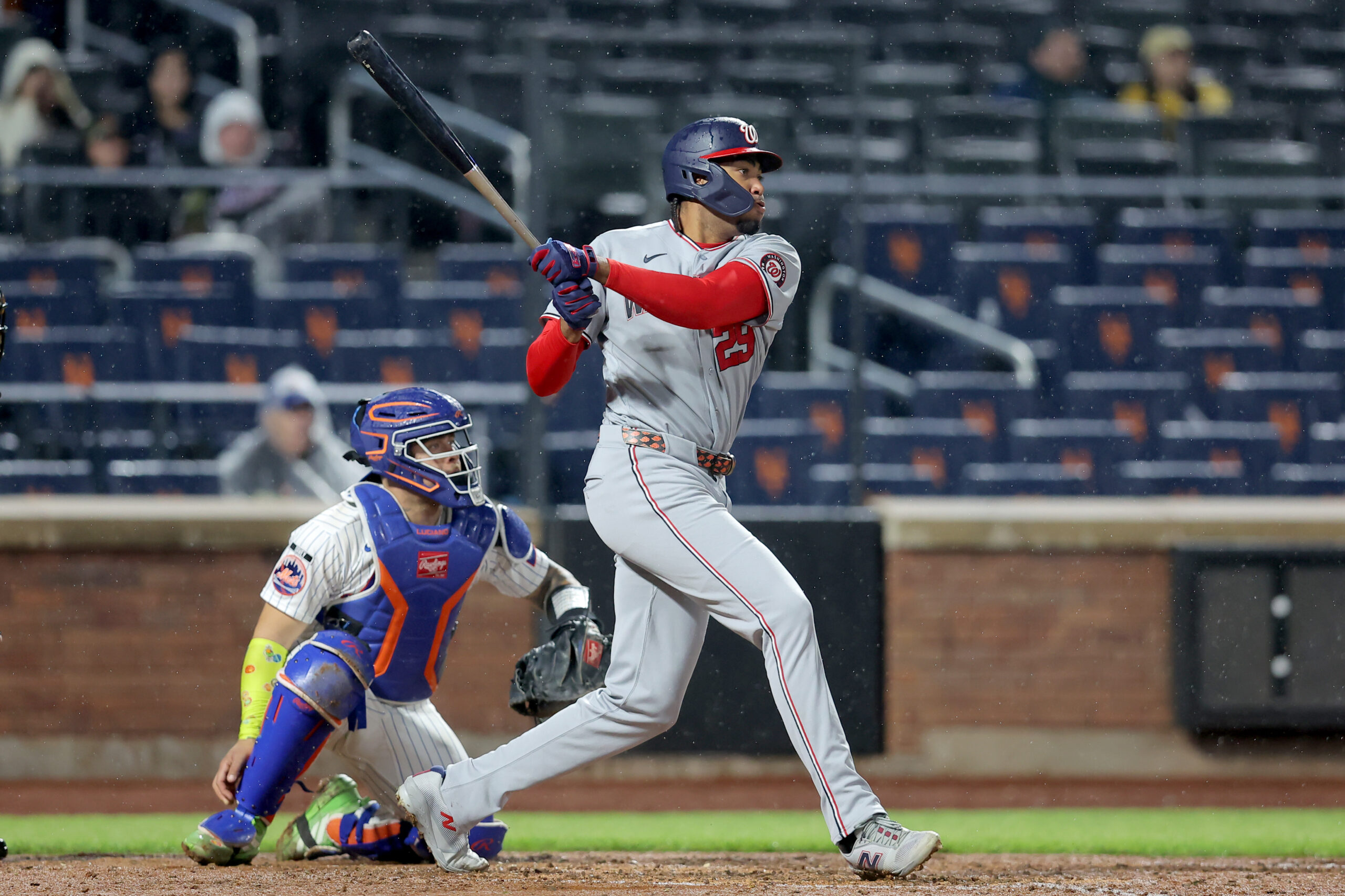 Apr 29, 2026; New York City, New York, USA; Washington Nationals designated hitter James Wood (29) follows through on a two run double against the New York Mets during the seventh inning at Citi Field. Mandatory Credit: Brad Penner-Imagn Images
