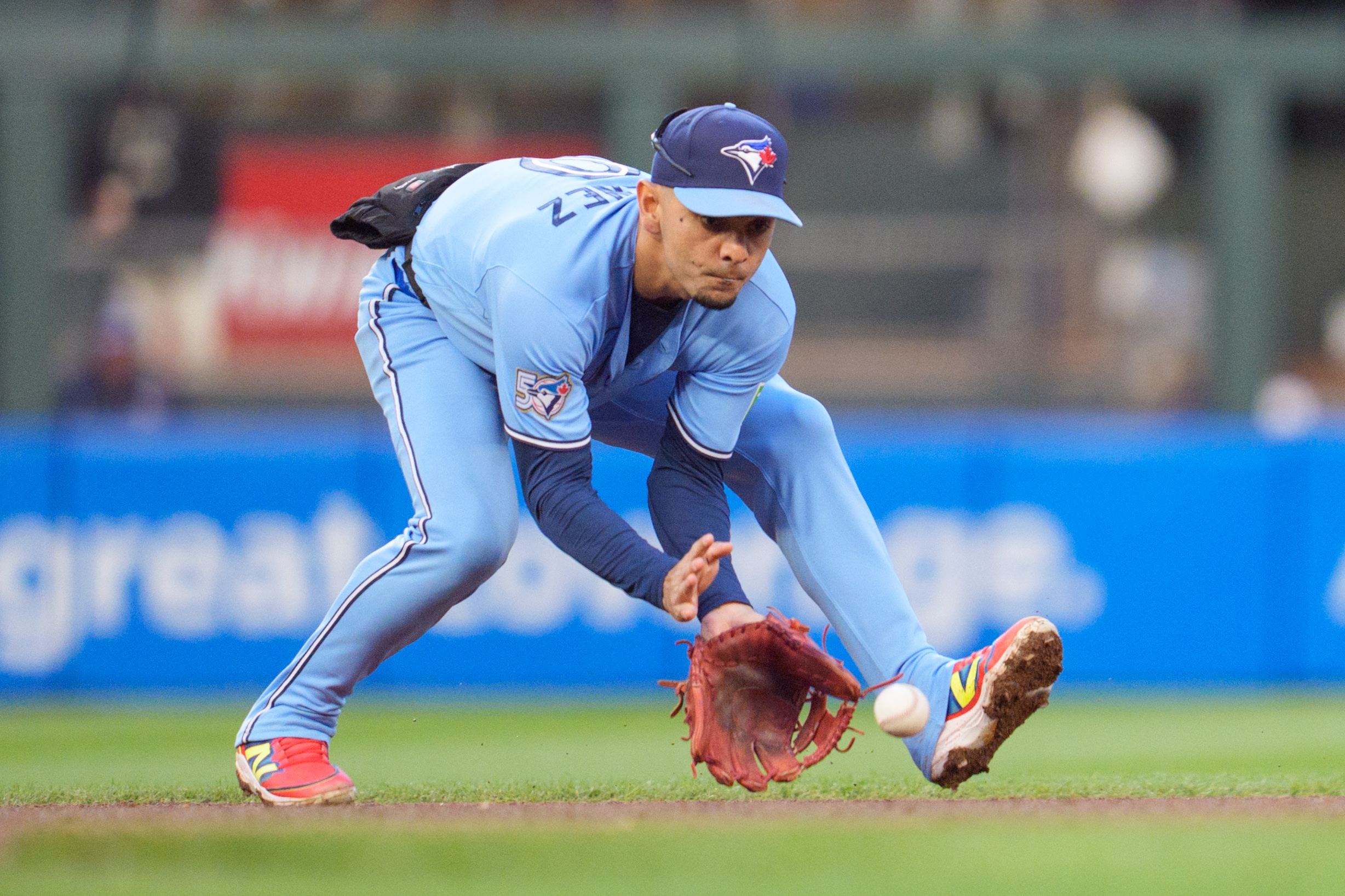 Apr 30, 2026; Minneapolis, Minnesota, USA; Toronto Blue Jays shortstop Andrés Giménez (0) fields a ground ball by Minnesota Twins second baseman Luke Keaschall (15) in the fifth inning at Target Field. Mandatory Credit: Matt Blewett-Imagn Images