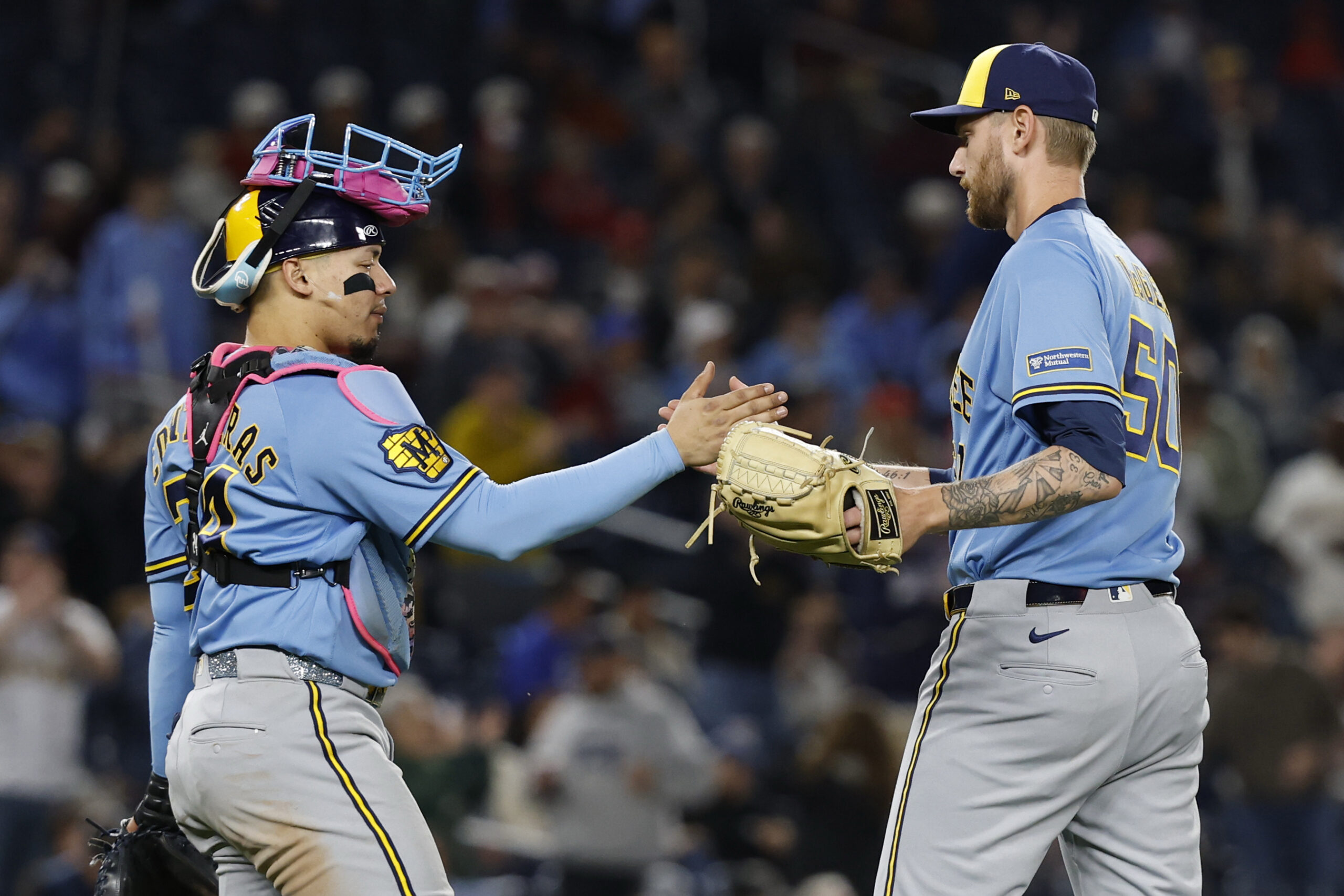 May 1, 2026; Washington, District of Columbia, USA; Milwaukee Brewers catcher William Contreras (24) celebrates with Brewers relief pitcher Easton McGee (50) after the final out against the Washington Nationals at Nationals Park. Mandatory Credit: Geoff Burke-Imagn Images