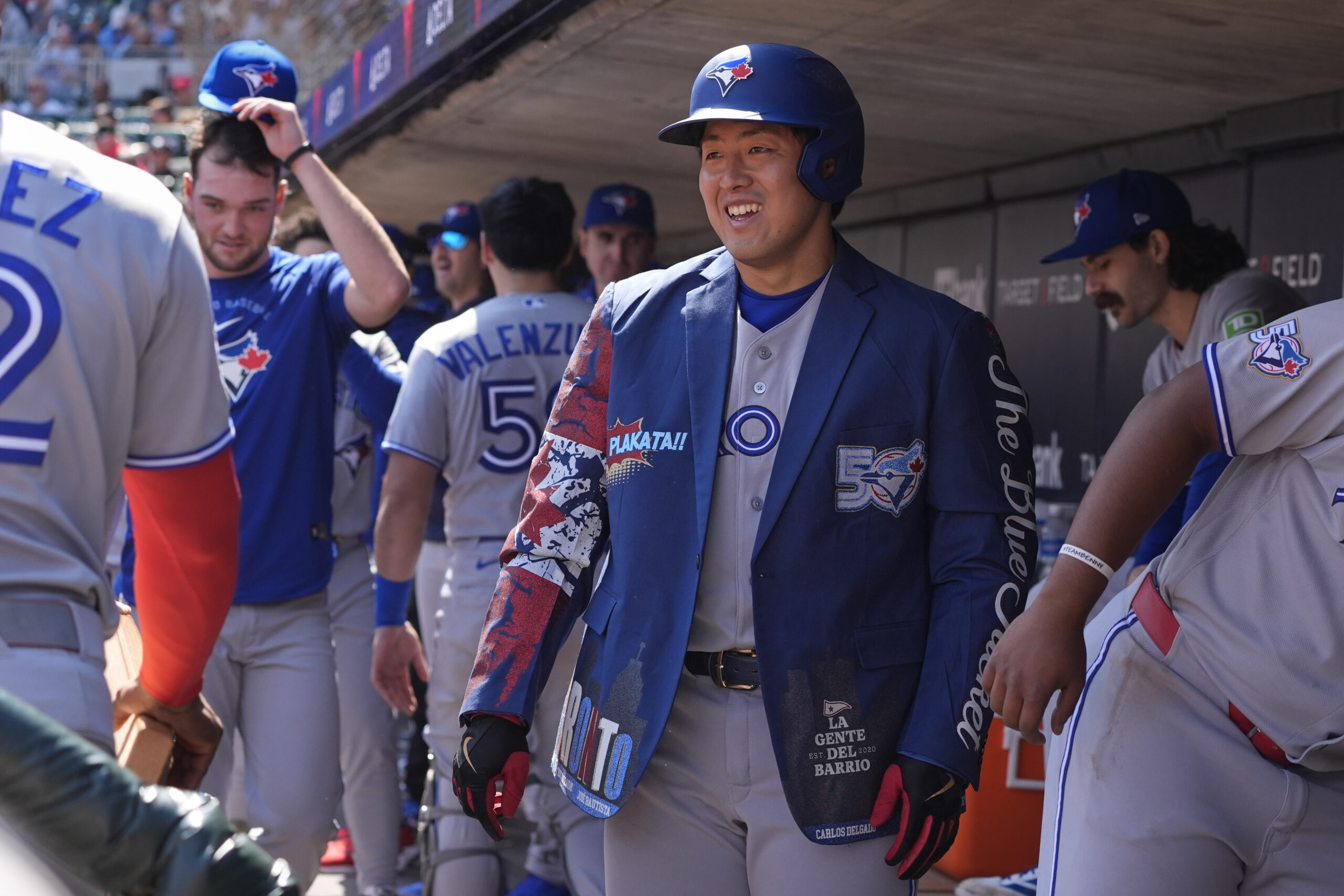 May 2, 2026; Minneapolis, Minnesota, USA; Toronto Blue Jays third baseman Kazuma Okamoto (7) celebrates his solo home run against the Minnesota Twins in the sixth inning at Target Field. Mandatory Credit: Bruce Kluckhohn-Imagn Images