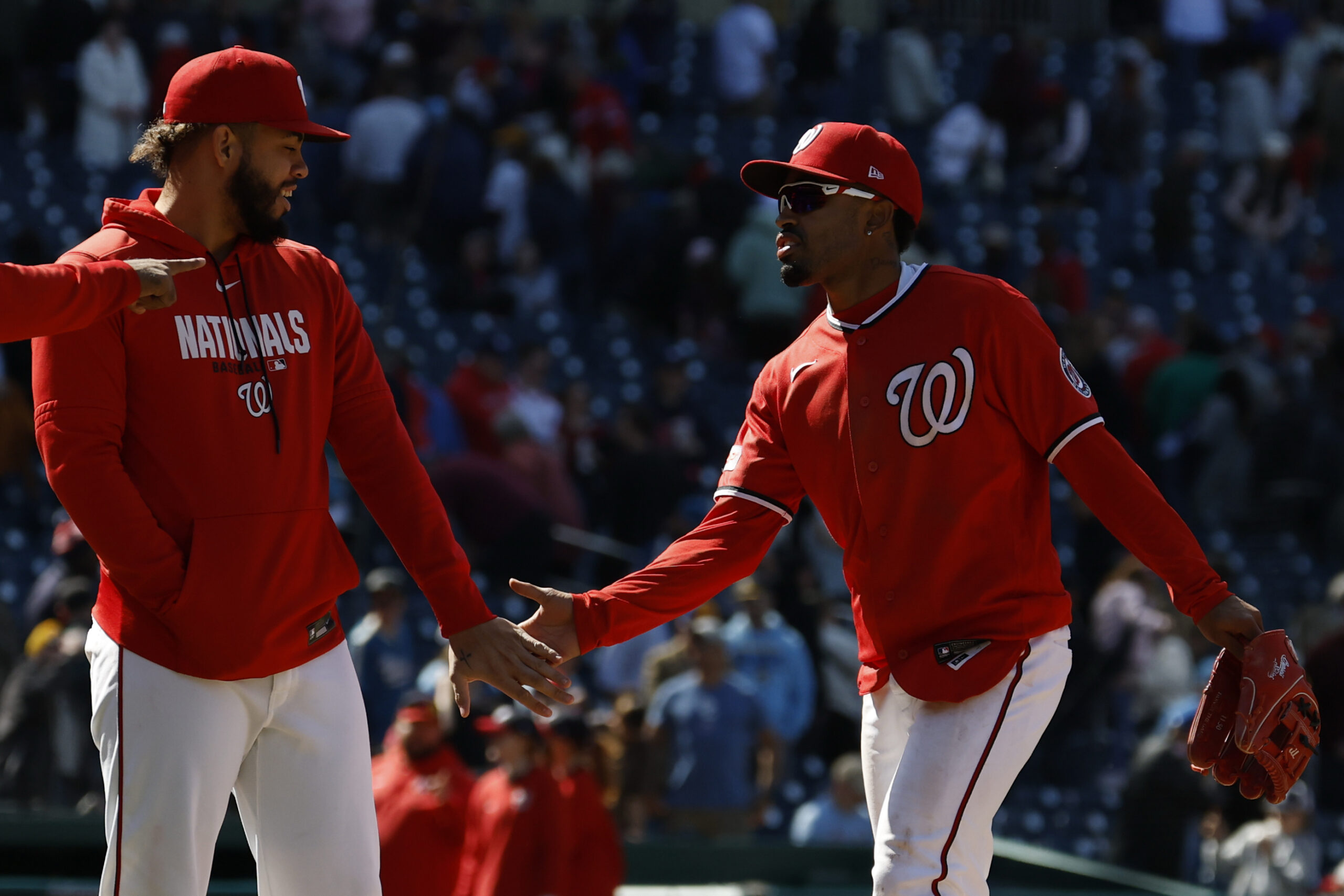 May 3, 2026; Washington, District of Columbia, USA; Washington Nationals second baseman Nasim Nuñez (R) celebrates with Nationals second baseman Luis García Jr. (L) after their game against the Milwaukee Brewers at Nationals Park. Mandatory Credit: Geoff Burke-Imagn Images
