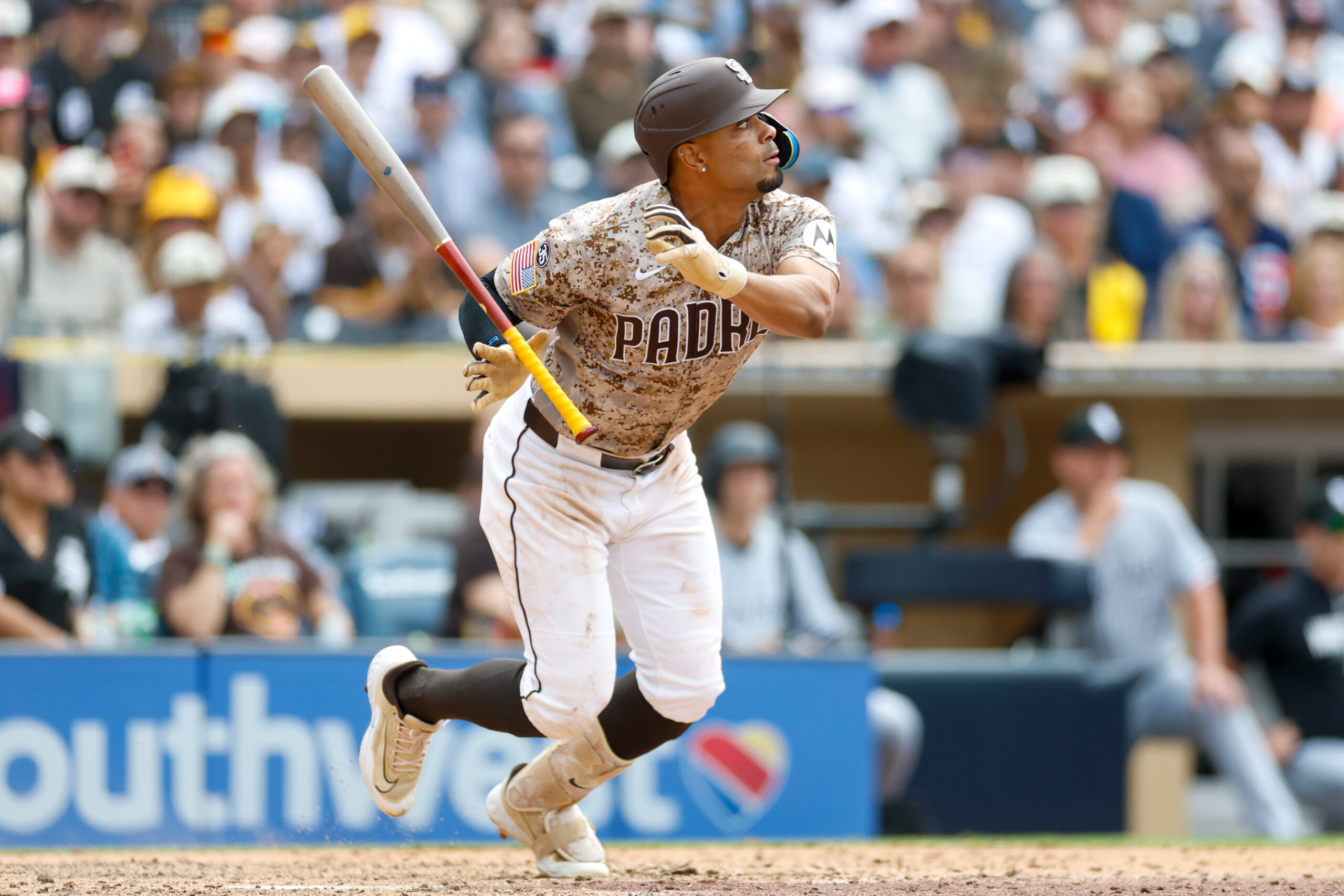 May 3, 2026; San Diego, California, USA; San Diego Padres shortstop Xander Bogaerts (2) hits a RBI infield single during the eighth inning against the Chicago White Sox at Petco Park. Mandatory Credit: David Frerker-Imagn Images