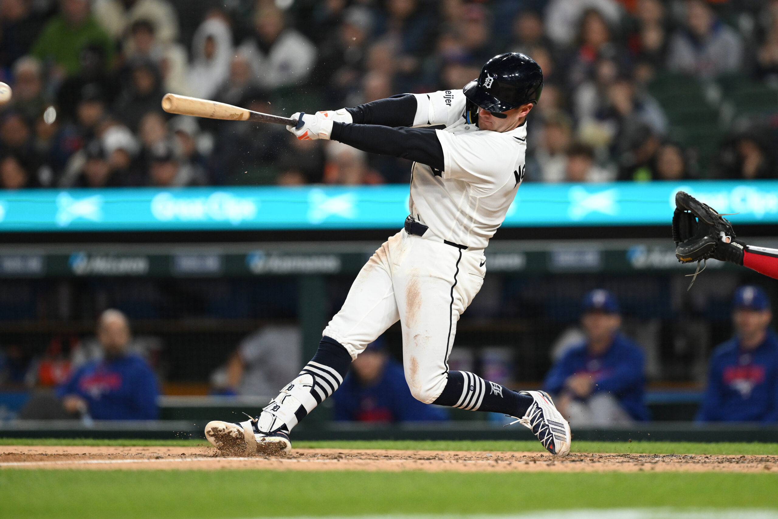 May 3, 2026; Detroit, Michigan, USA;  Detroit Tigers shortstop Kevin McGonigle (7) hits a RBI single against the Texas Rangers in the sixth inning at Comerica Park. Mandatory Credit: Lon Horwedel-Imagn Images
