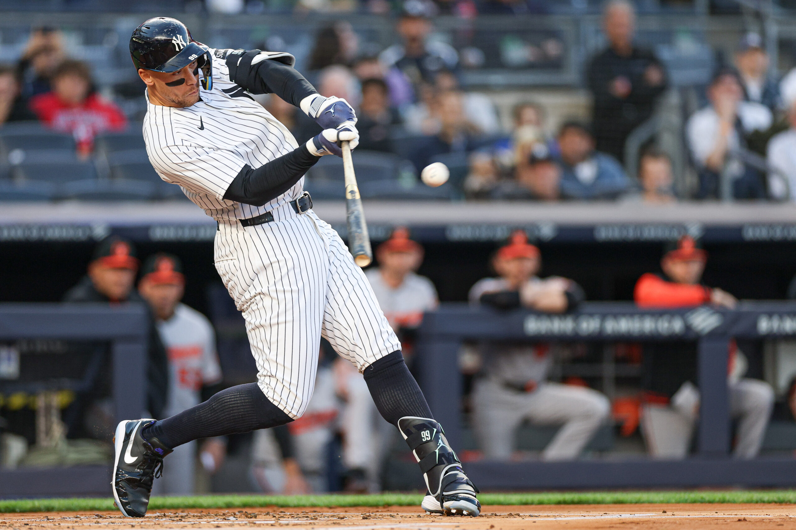 May 4, 2026; Bronx, New York, USA; New York Yankees right fielder Aaron Judge (99) hits a two run home run during the first inning against the Baltimore Orioles at Yankee Stadium. Mandatory Credit: Vincent Carchietta-Imagn Images