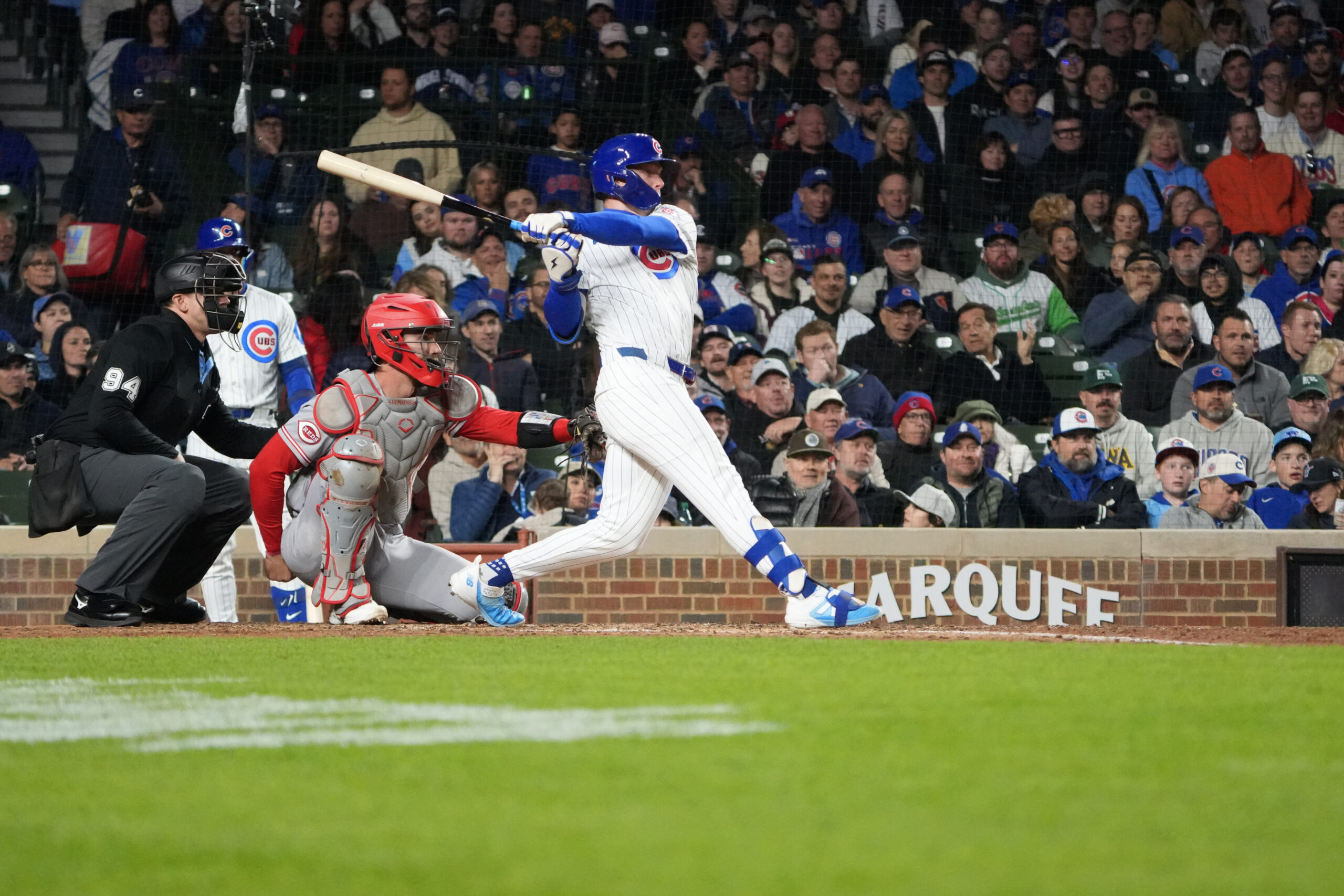 May 5, 2026; Chicago, Illinois, USA; Chicago Cubs center fielder Pete Crow-Armstrong (4) hits a single against the Cincinnati Reds during the seventh inning at Wrigley Field. Mandatory Credit: David Banks-Imagn Images