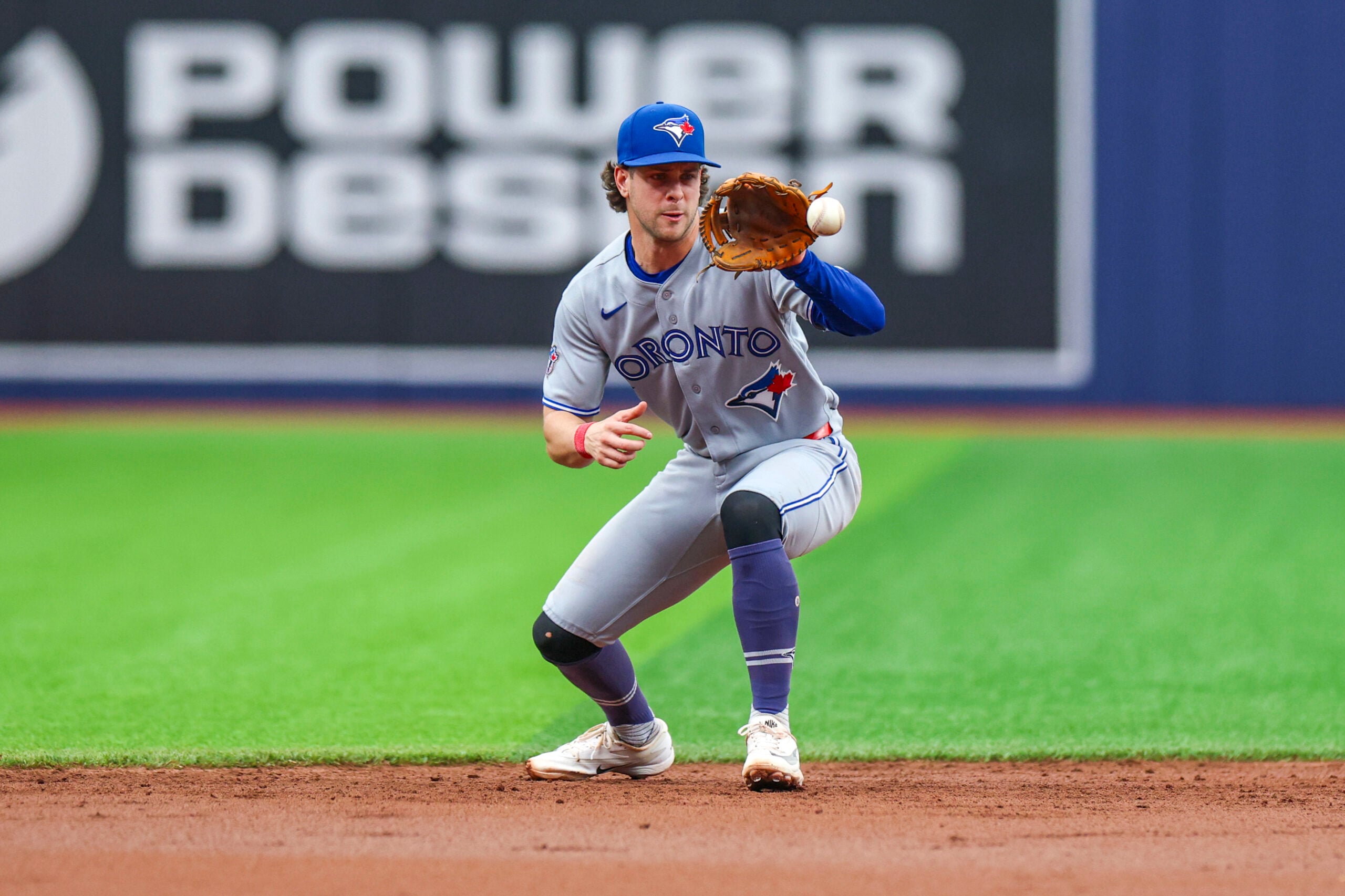 May 6, 2026; St. Petersburg, Florida, USA; Toronto Blue Jays shortstop Ernie Clement (22) fields the ball against the Tampa Bay Rays in the second inning at Tropicana Field. Mandatory Credit: Nathan Ray Seebeck-Imagn Images