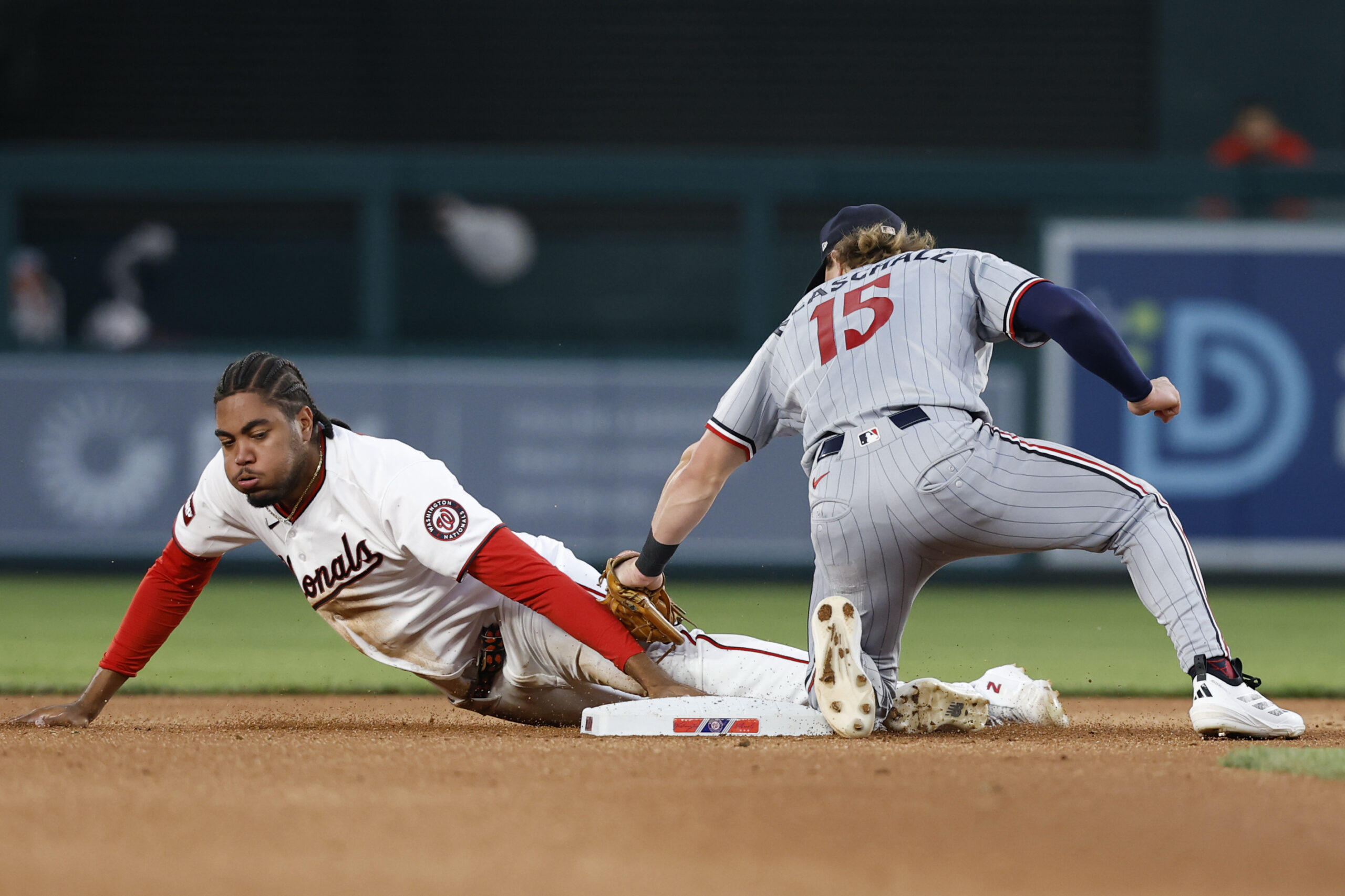May 6, 2026; Washington, District of Columbia, USA; Washington Nationals right fielder James Wood (29) steals second base ahead of a tag by Minnesota Twins second baseman Luke Keaschall (15) during the fourth inning at Nationals Park. Mandatory Credit: Geoff Burke-Imagn Images