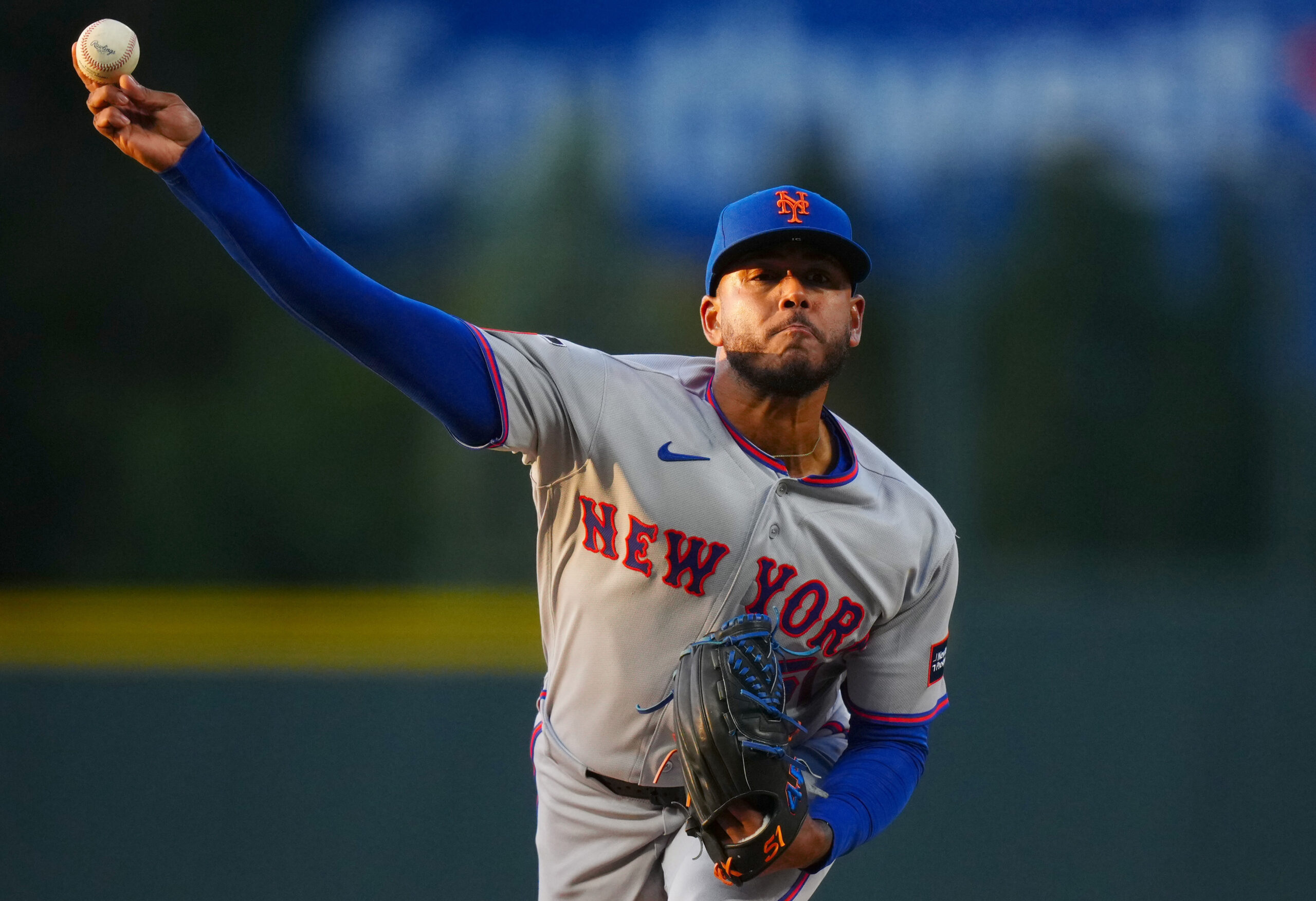 May 6, 2026; Denver, Colorado, USA; New York Mets starting pitcher Freddy Peralta (51) delivers a pitch against the Colorado Rockies in the first inning at Coors Field. Mandatory Credit: Ron Chenoy-Imagn Images
