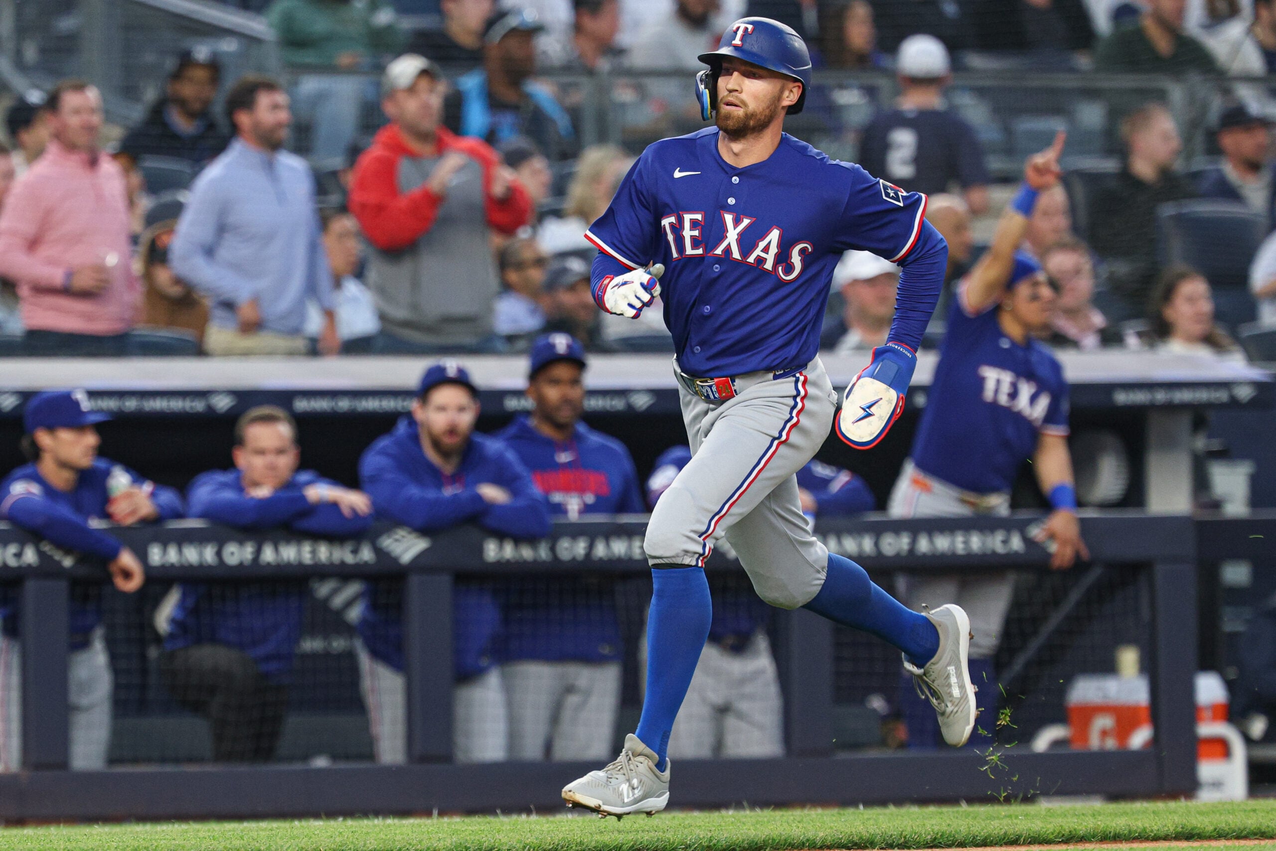 May 6, 2026; Bronx, New York, USA; Texas Rangers right fielder Brandon Nimmo (24) scores on an RBI double by left fielder Ezequiel Duran (not pictured) during the third inning against the New York Yankees at Yankee Stadium. Mandatory Credit: Vincent Carchietta-Imagn Images