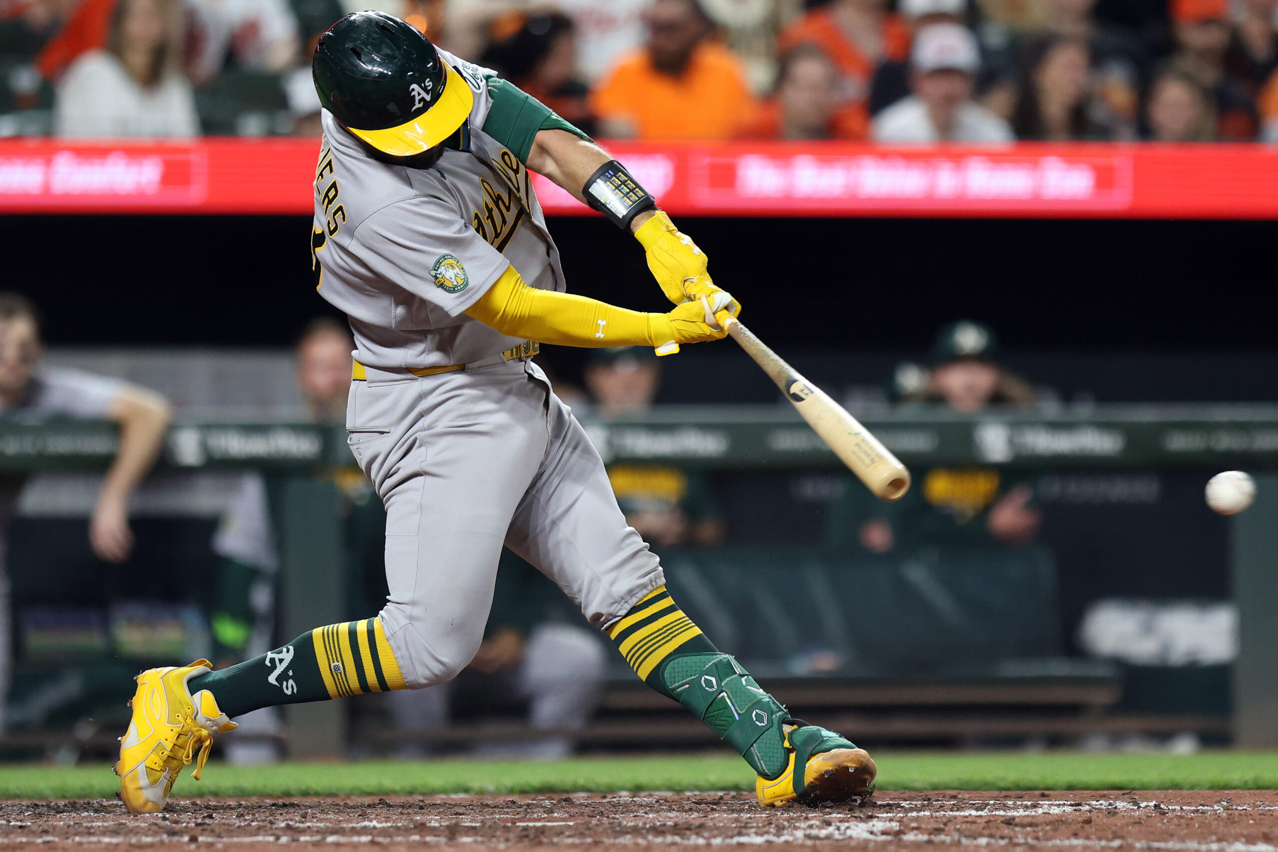 May 8, 2026; Baltimore, Maryland, USA; Athletics catcher Shea Langeliers (23) hits a single during the eighth inning against the Baltimore Orioles at Oriole Park at Camden Yards. Mandatory Credit: Daniel Kucin Jr.-Imagn Images