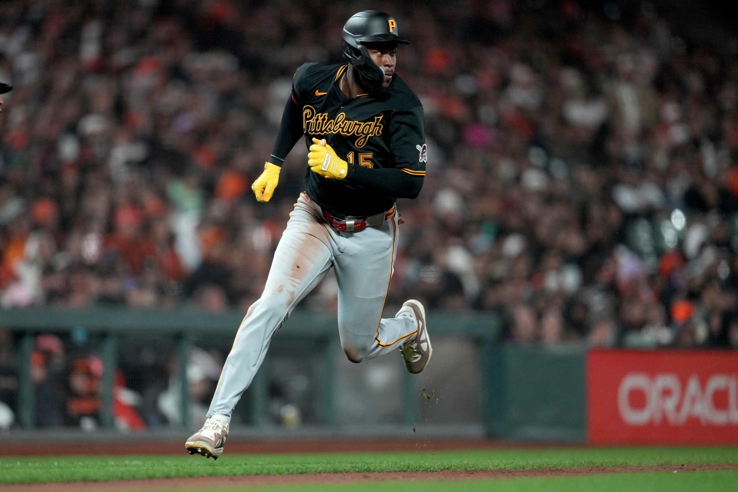 May 8, 2026; San Francisco, California, USA; Pittsburgh Pirates center fielder Oneil Cruz (15) scores against the San Francisco Giants in the ninth inning at Oracle Park. Mandatory Credit: Cary Edmondson-Imagn Images