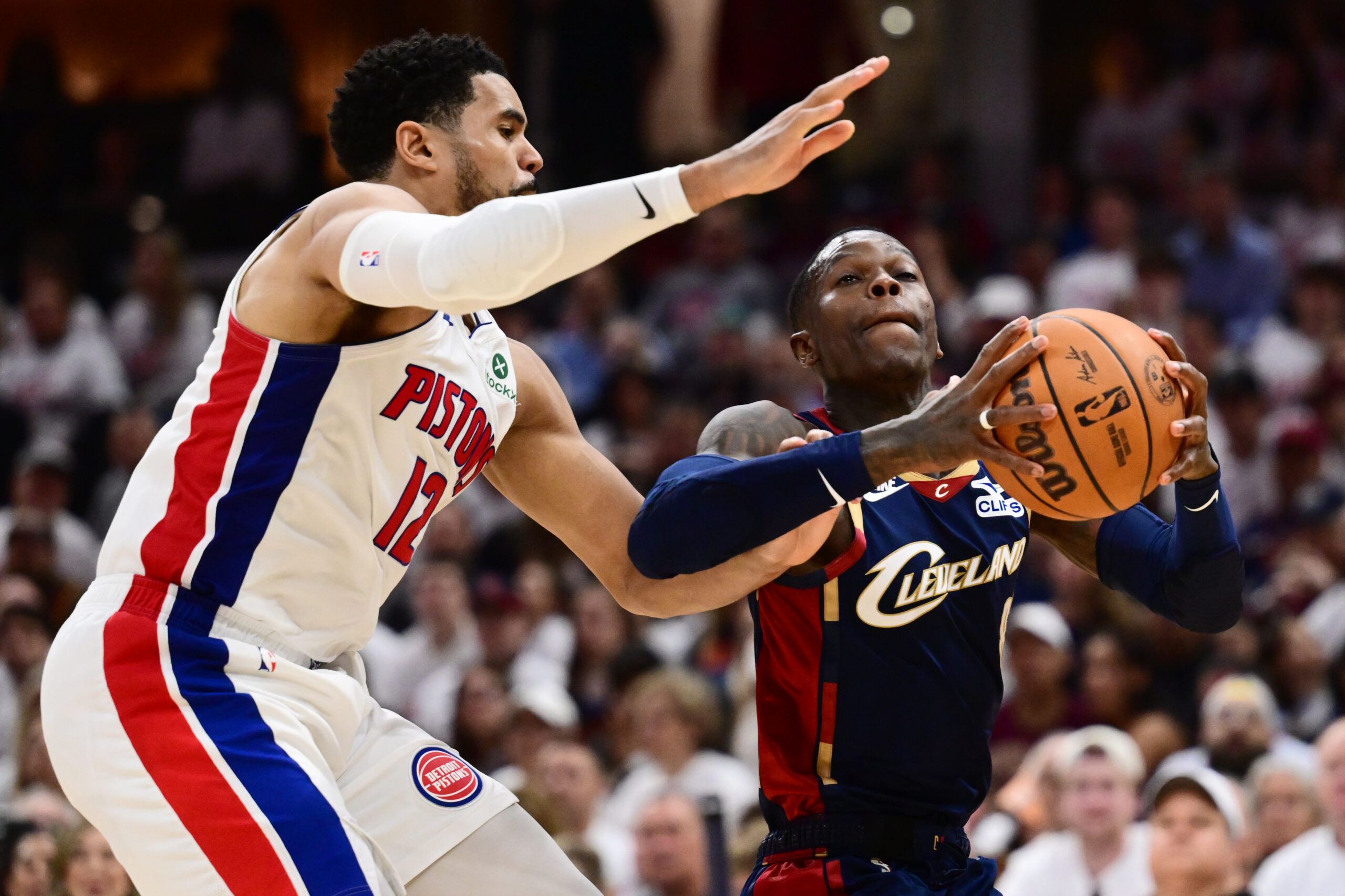 May 9, 2026; Cleveland, Ohio, USA; Cleveland Cavaliers guard Dennis Schroder (8) drives to the basket against Detroit Pistons forward Tobias Harris (12) during the second half of game three in the second round of the 2026 NBA Playoffs at Rocket Arena. Mandatory Credit: Ken Blaze-Imagn Images