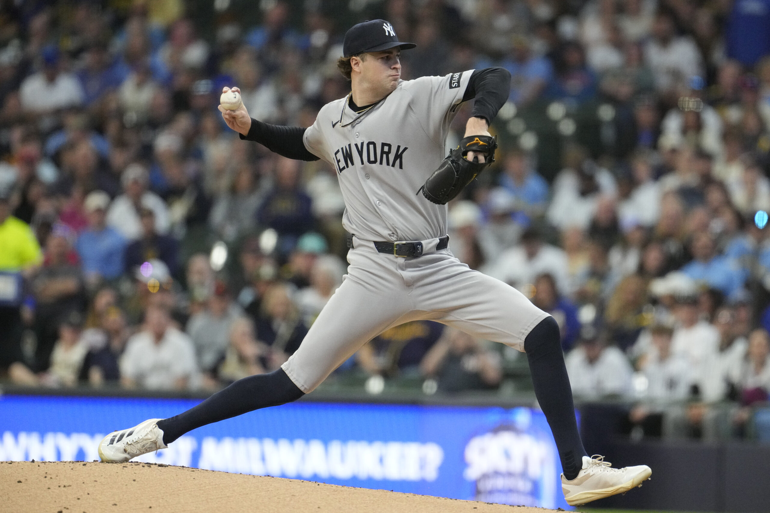 May 9, 2026; Milwaukee, Wisconsin, USA; New York Yankees pitcher Cam Schlittler (31) delivers a pitch against the Milwaukee Brewers in the first inning at American Family Field. Mandatory Credit: Michael McLoone-Imagn Images