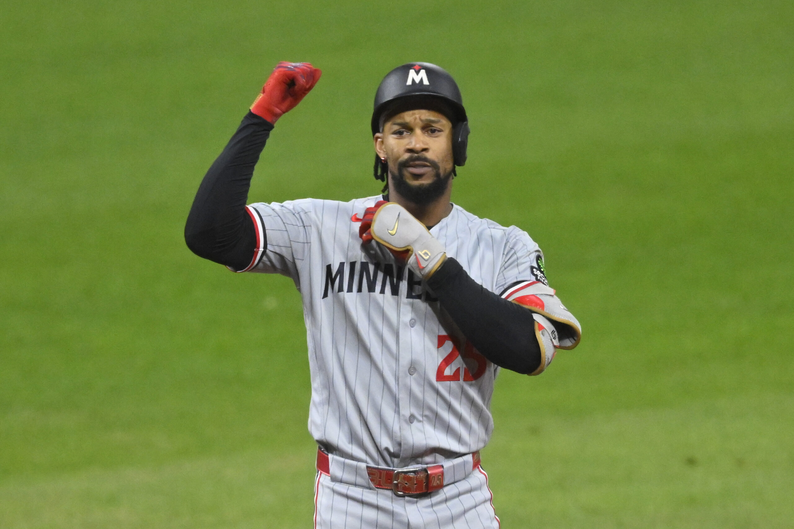 May 9, 2026; Cleveland, Ohio, USA; Minnesota Twins center fielder Byron Buxton (25) celebrates his RBI double in the eleventh inning against the Cleveland Guardians at Progressive Field. Mandatory Credit: David Richard-Imagn Images