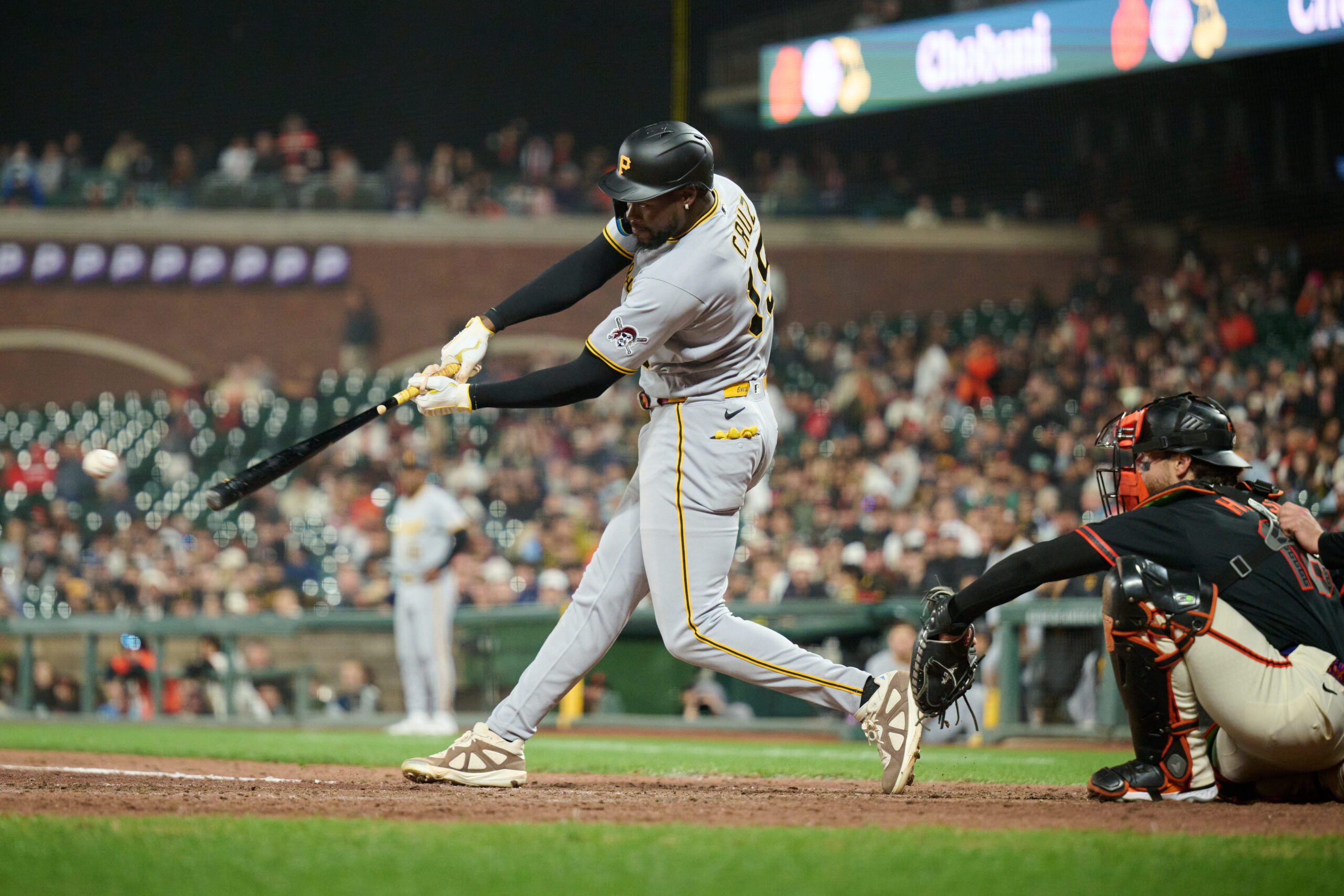 May 9, 2026; San Francisco, California, USA; Pittsburgh Pirates outfielder Oneil Cruz (15) hits a single against the San Francisco Giants during the ninth inning at Oracle Park. Mandatory Credit: Robert Edwards-Imagn Images